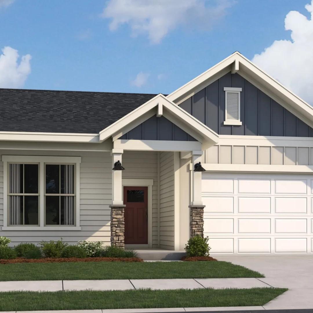 Modern craftsman ranch home exterior at Cape Reserve Donahue Ridge in Auburn Alabama with gabled roof stone accents and covered porch