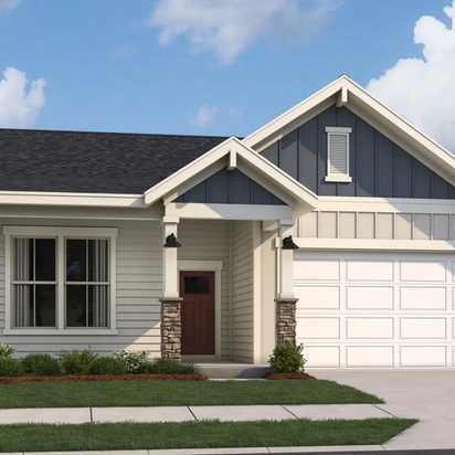 Modern craftsman ranch home exterior at Cape Reserve Donahue Ridge in Auburn Alabama with gabled roof stone accents and covered porch