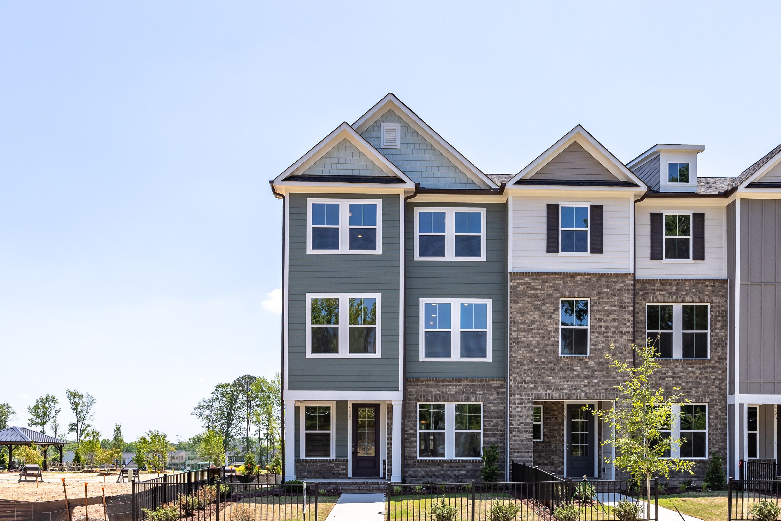 Three-story townhouse exterior at Summers Walk in Davidson, North Carolina built by Davidson Homes.