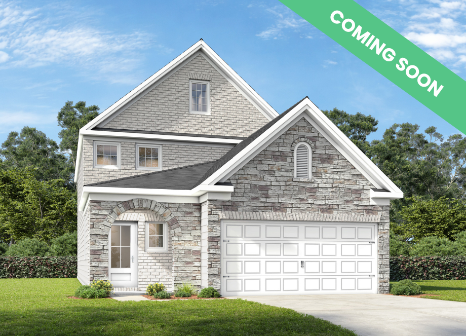 The Summit J two-story home elevation featuring a brick and shingle exterior with a two-car garage.