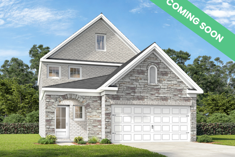 The Summit J two-story home elevation featuring a brick and shingle exterior with a two-car garage.