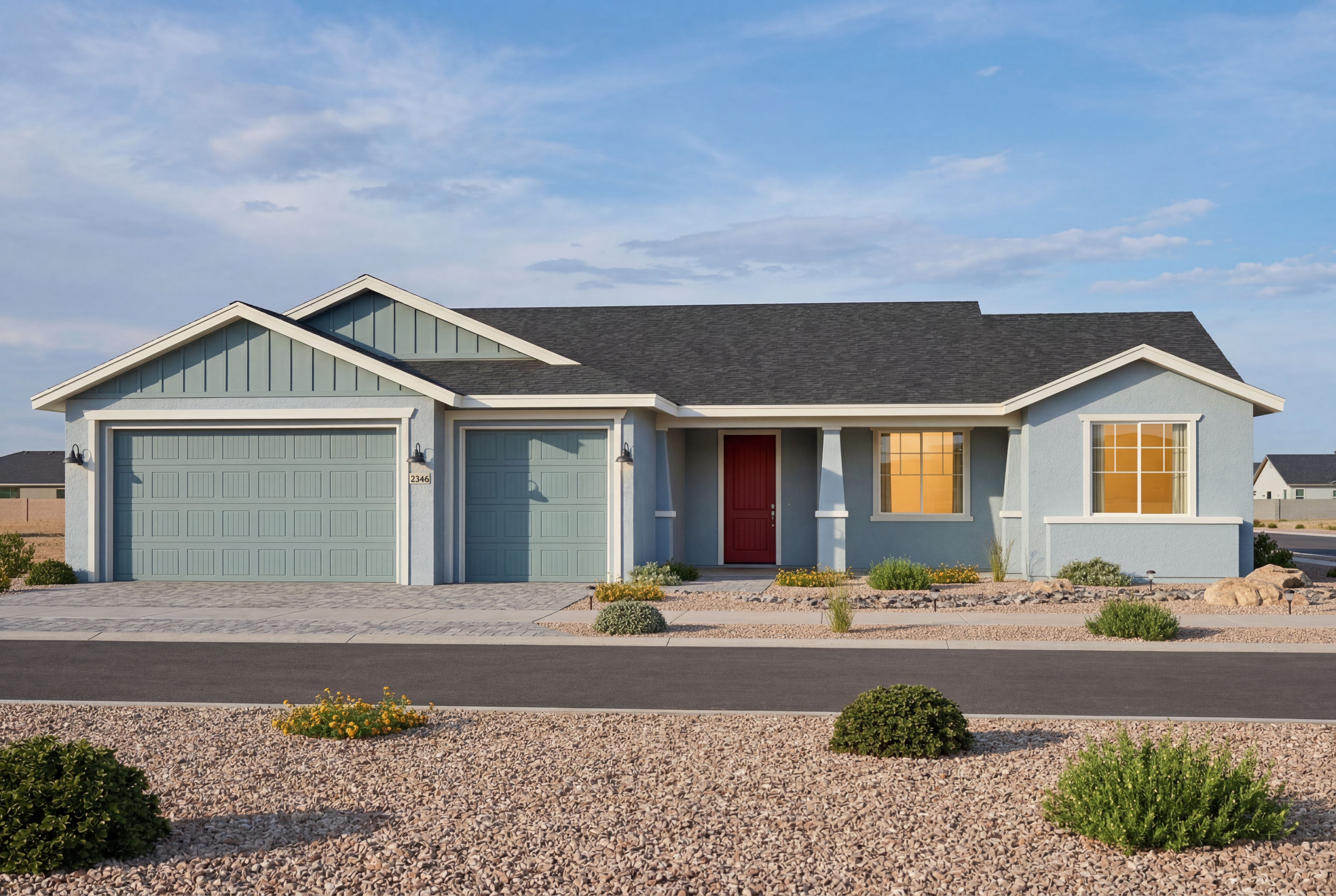 The Monarch single-story home in Prescott Valley, AZ featuring a 3-car garage and vibrant red front door.