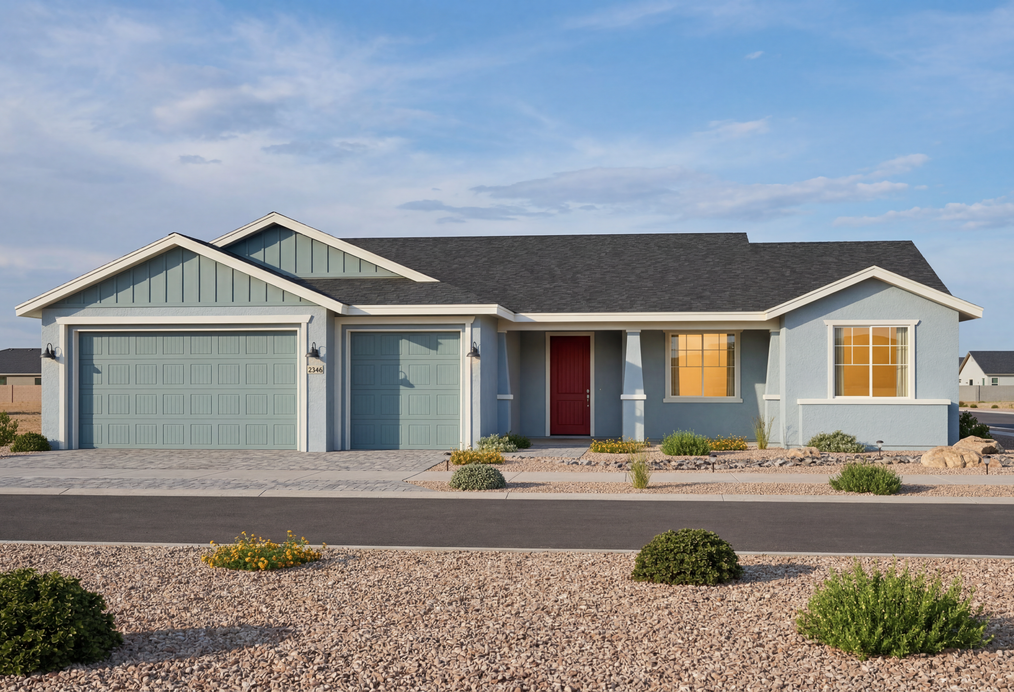 The Monarch single-story home in Prescott Valley, AZ featuring a 3-car garage and vibrant red front door.