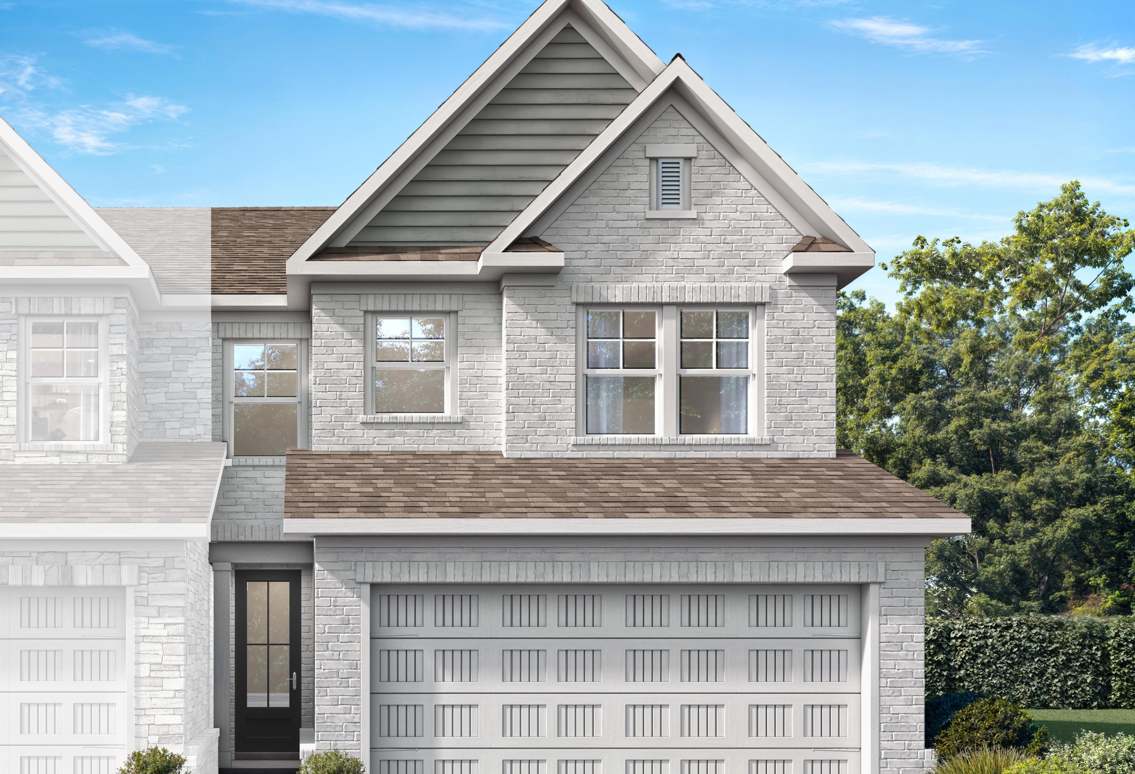 Two-story Cary A-LS brick home elevation with 2-car garage, shingled roof, and lush landscaping in Winder, Georgia