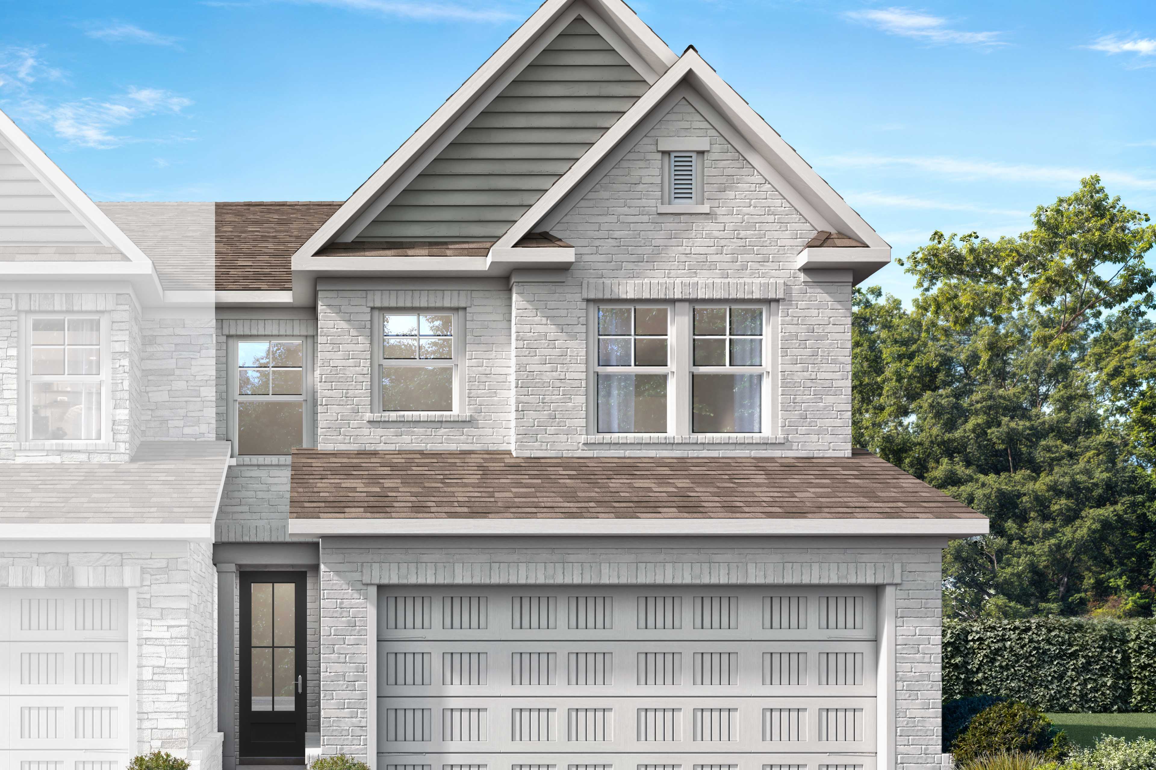 Two-story Cary A-LS brick home elevation with 2-car garage, shingled roof, and lush landscaping in Winder, Georgia