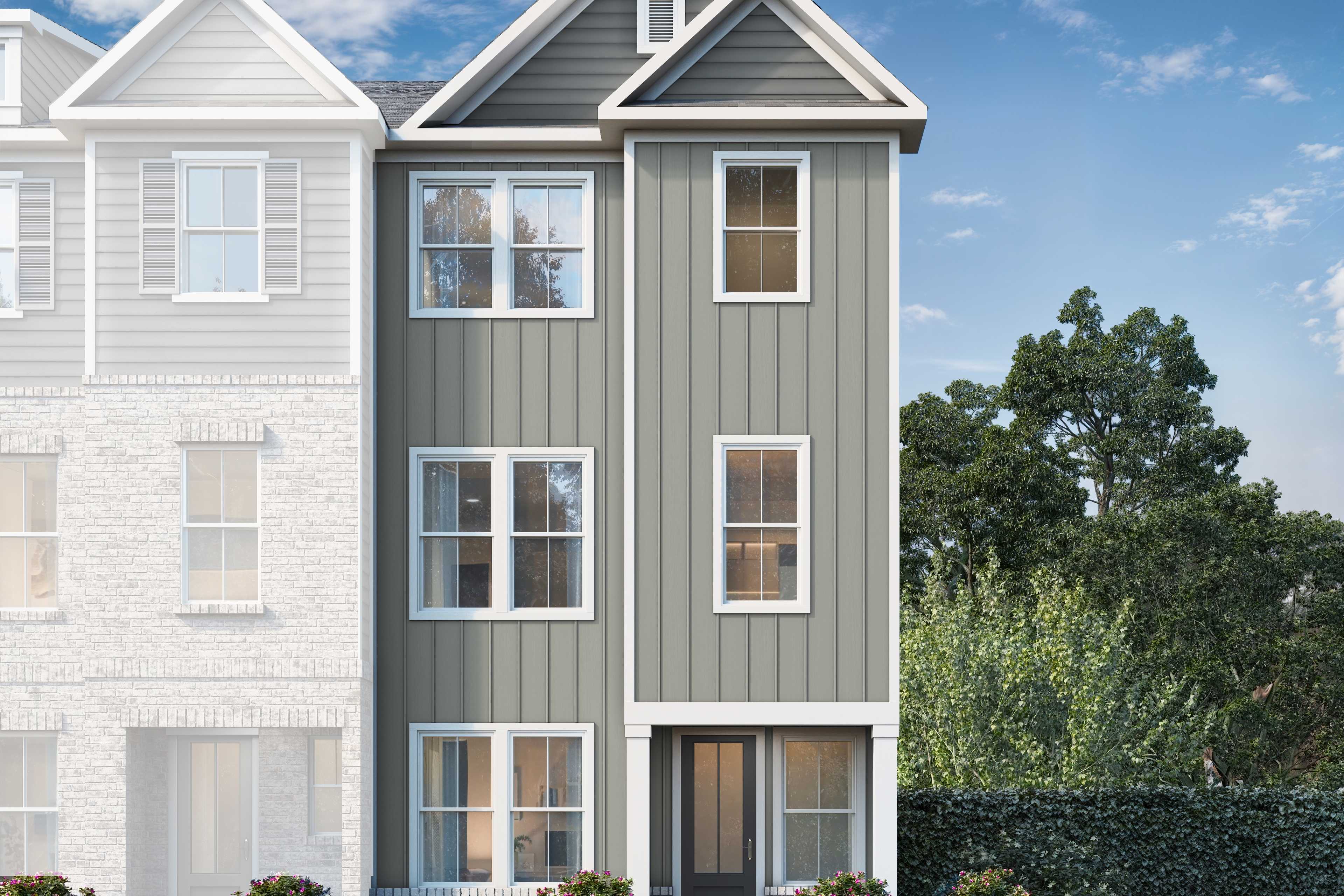 Three-story multi-family townhome elevation of The Lincoln B featuring gray siding, white brick accents, windows, and landscaped front yard in Woodstock GA