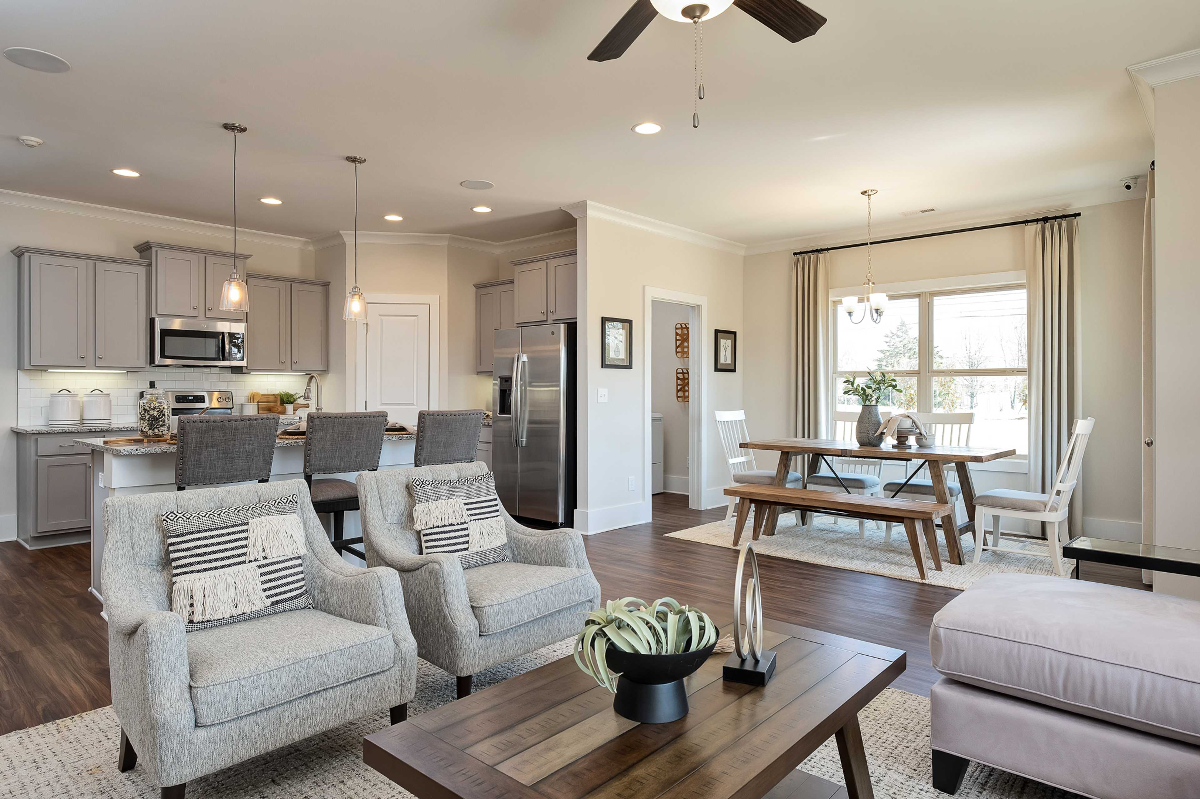 open-concept great room, dining area, and kitchen in Hartselle, AL