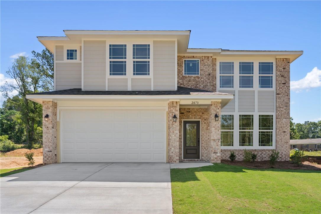 Two-story Stella C floor plan by Davidson Homes with brick and siding exterior in Links Crossing, Auburn, Alabama.