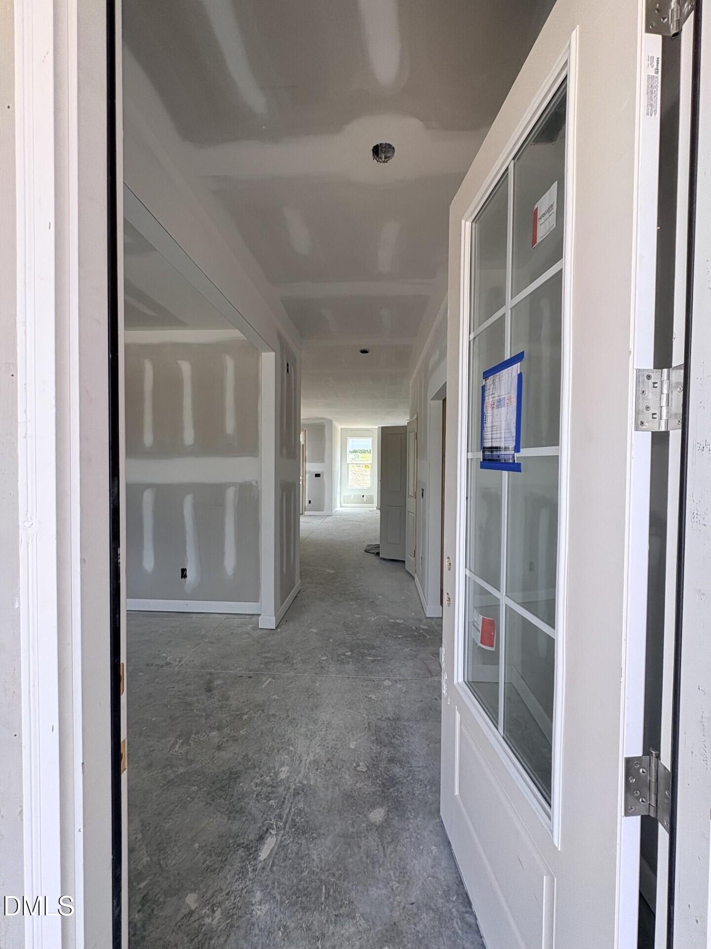 Interior entryway under construction in The Ash C floor plan by Davidson Homes at Woodland Crossing in Zebulon, NC.
