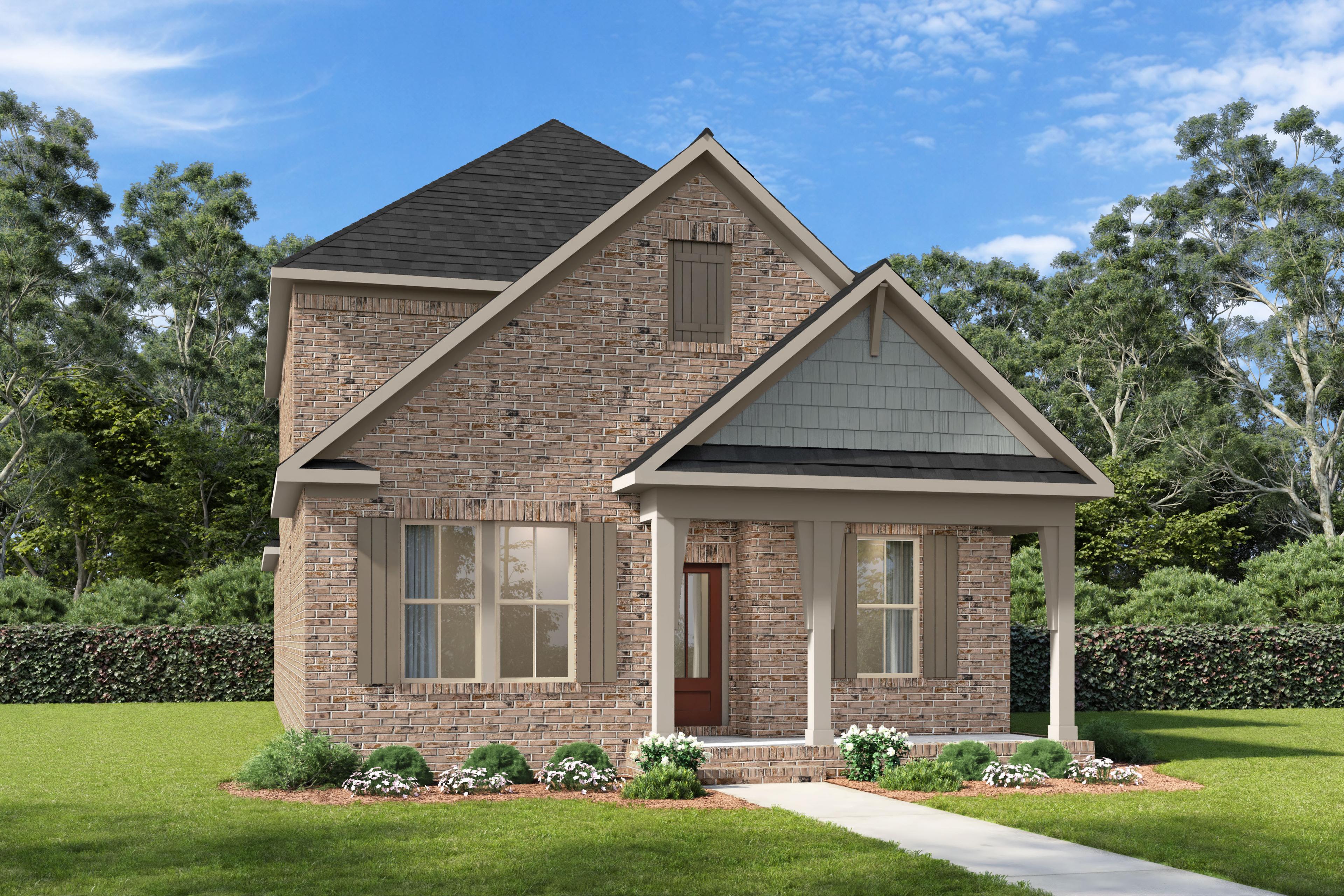 Front elevation of The Fairmont by Davidson Homes featuring brick exterior, covered porch, and gabled roofline in Mt. Juliet, TN