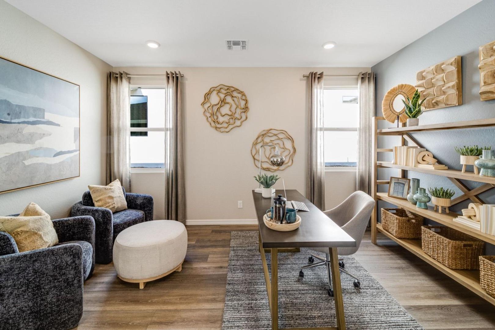 Modern home office at South Ranch Destination Collection in Prescott AZ with built-in bookshelves, desk, and abstract wall art