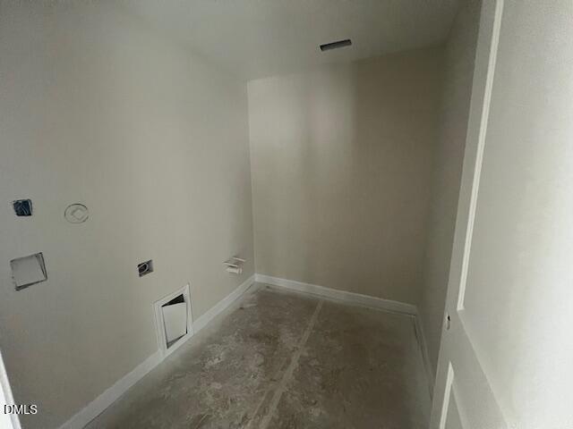 Unfinished laundry room with plumbing rough-ins, electrical outlets, and beige walls in Davidson Homes The Preston A, Lillington, NC