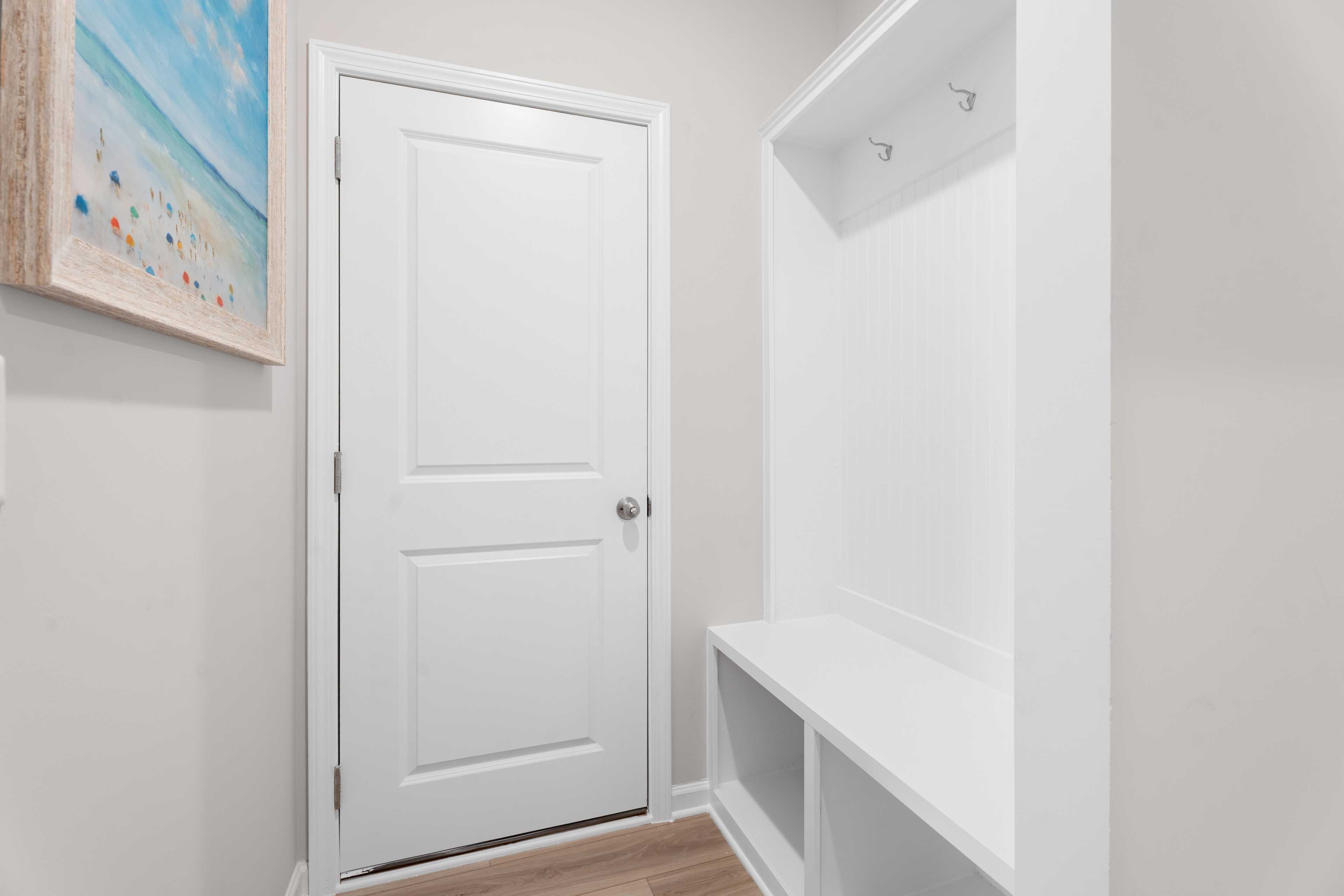 Entryway with white mud bench