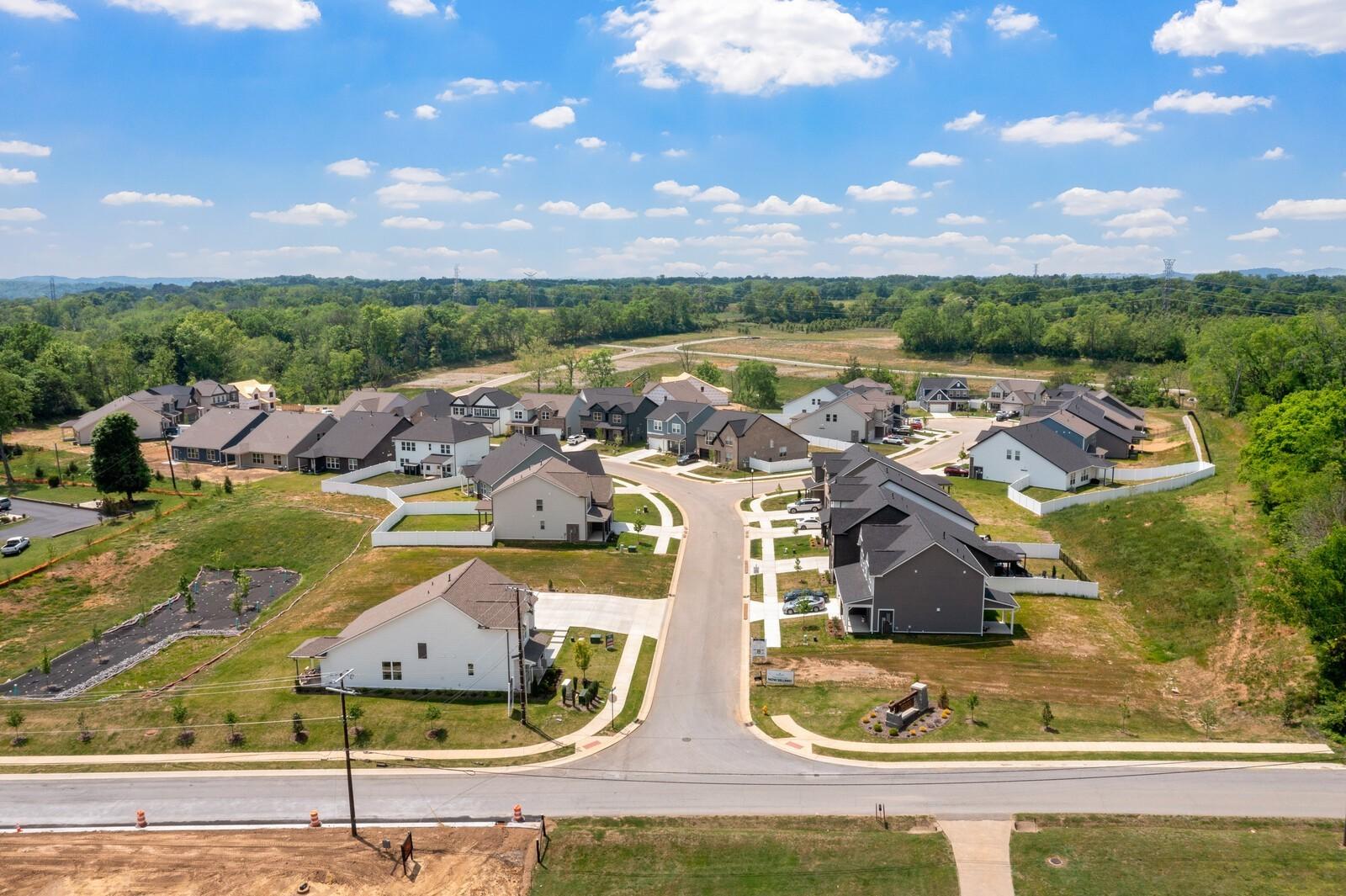 Aerial view of the Woods Crossing residential community in Gallatin, Tennessee, featuring new homes by Davidson Homes.