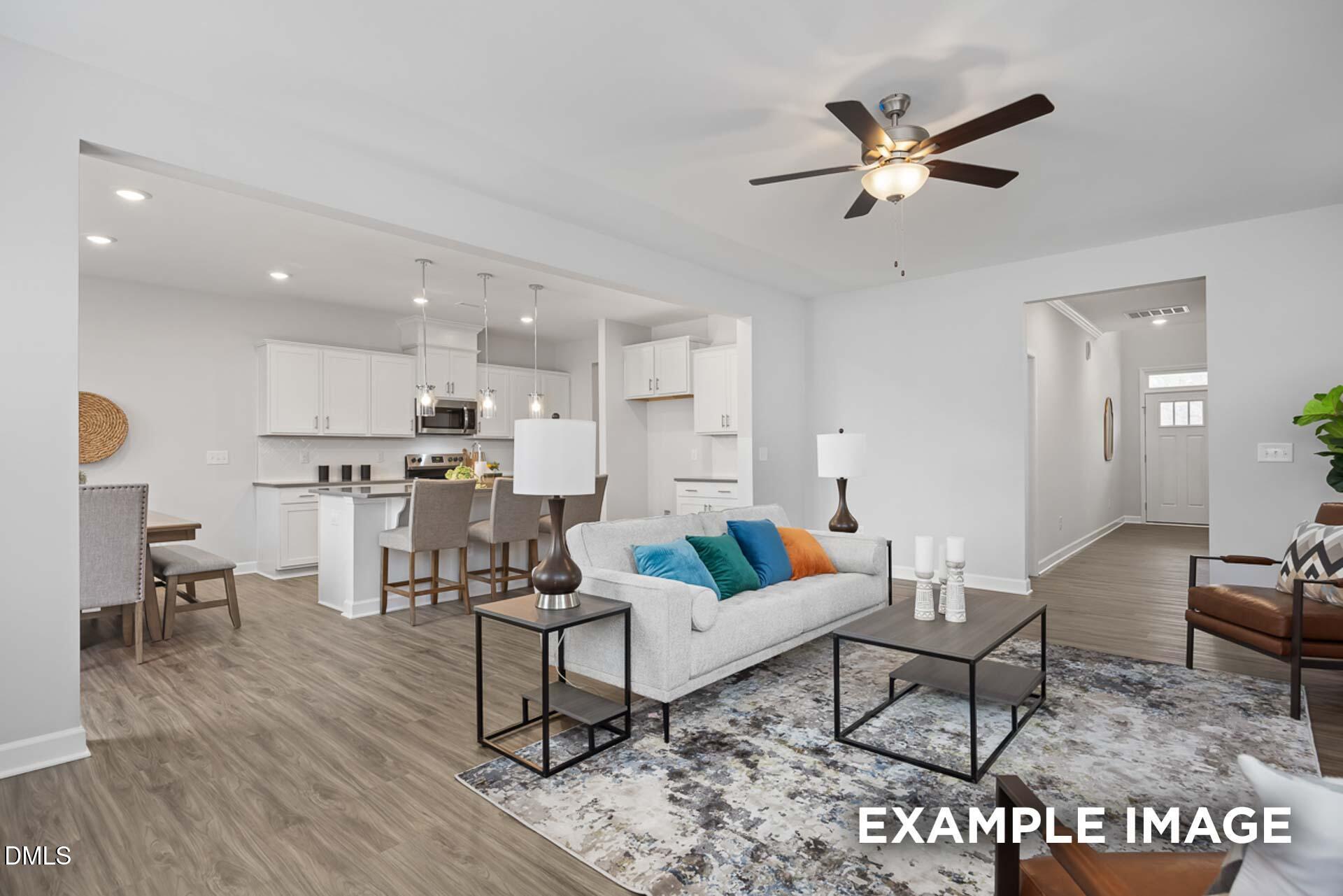 Open-concept living room and kitchen in The Gavin C floor plan at Gregory Village, Lillington, North Carolina.