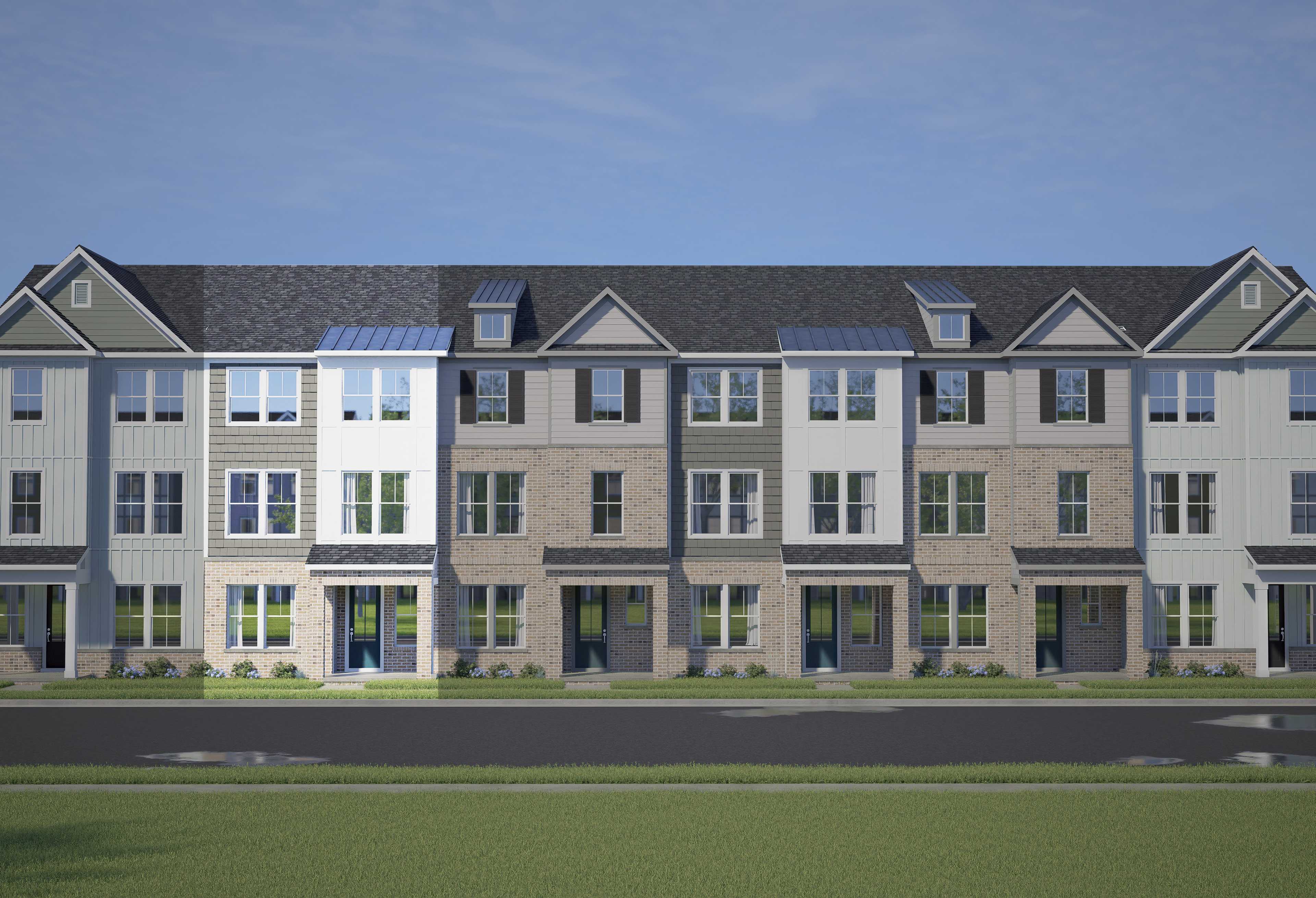 Modern row of 3-story The Avery townhomes with white, gray, and brick siding, 2-car garages, and front porches in Knightdale, NC