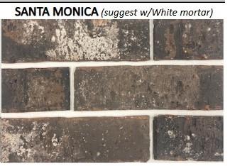 Textured Santa Monica brick with white mortar on exterior of Davidson Homes The Luna J in Sunterra, Katy, Texas