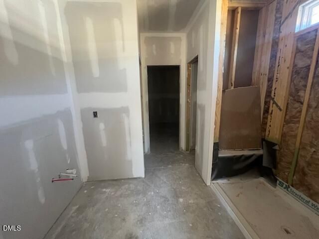 Unfinished interior with drywall and framing during construction of Davidson Homes' The Ash C floor plan in Lillington, North Carolina.