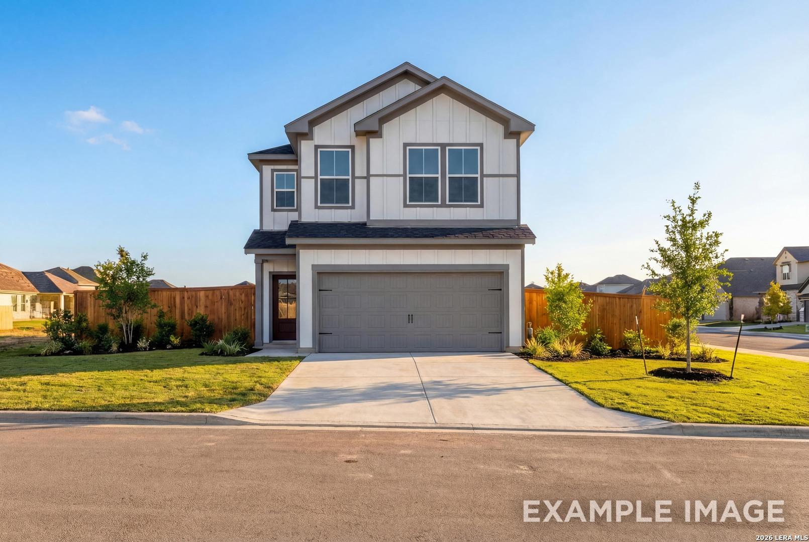 Modern two-story 4-bedroom home with shiplap siding, 2-car garage, and landscaped yard in Meadows at Oak Creek, San Antonio