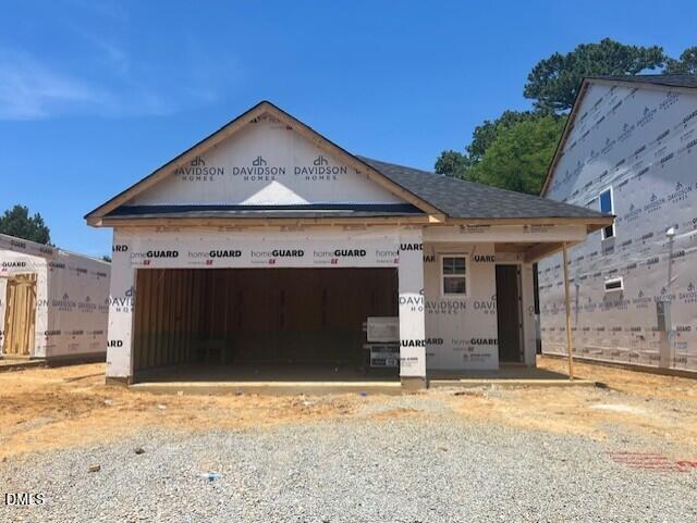New construction 1-story home by Davidson Homes with 2-car garage in Gregory Village, Lillington, North Carolina.
