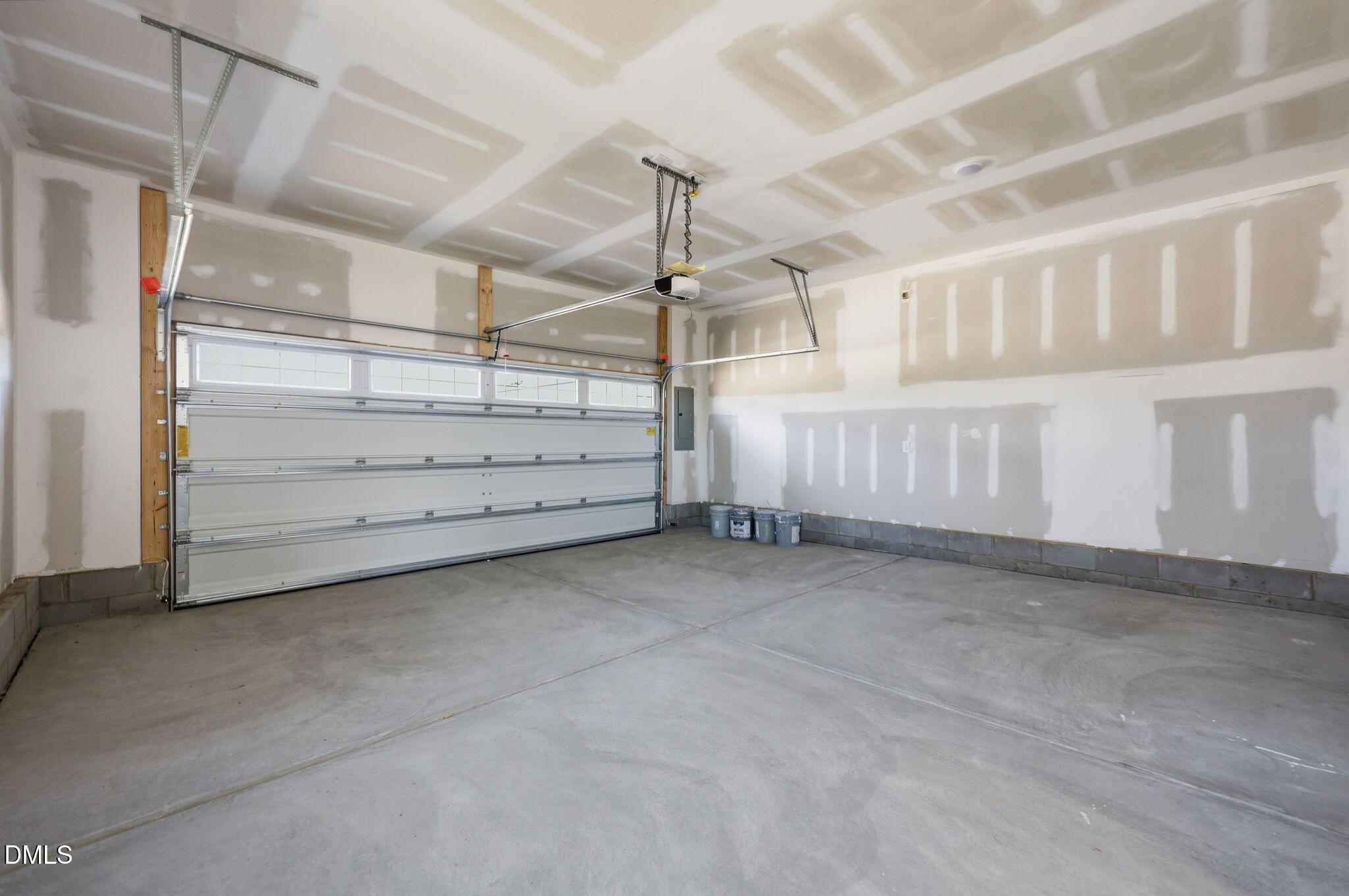 Unfinished 2-car garage in The Avery floor plan by Davidson Homes at Forestville Yard Townhomes in Knightdale, NC.