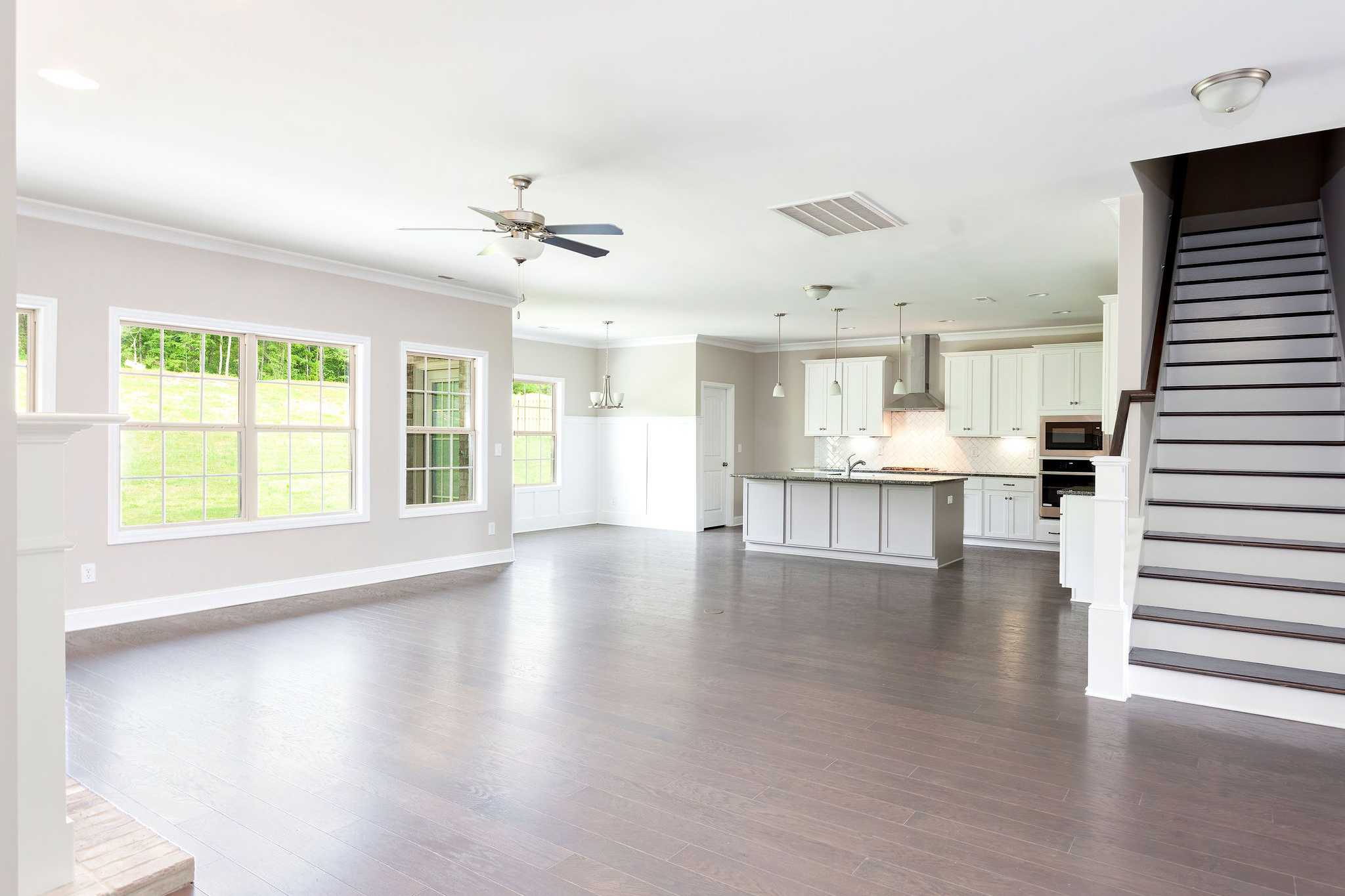 Davidson Homes The Emory Floor Plan Unfurnished Living Room looking into staircase and kitchen