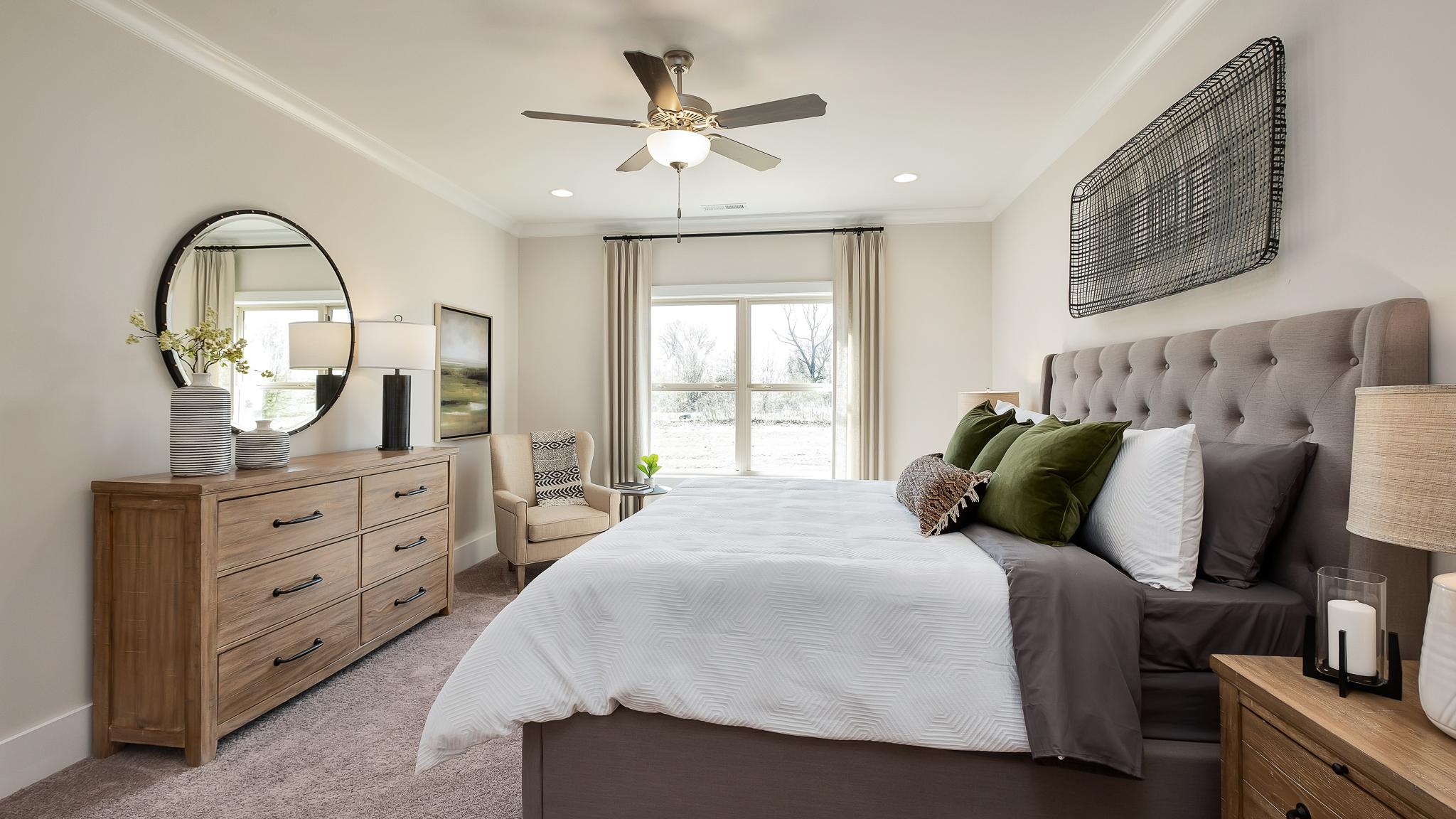 owner's suite with double windows in Magnolia Preserve in Hartselle, AL