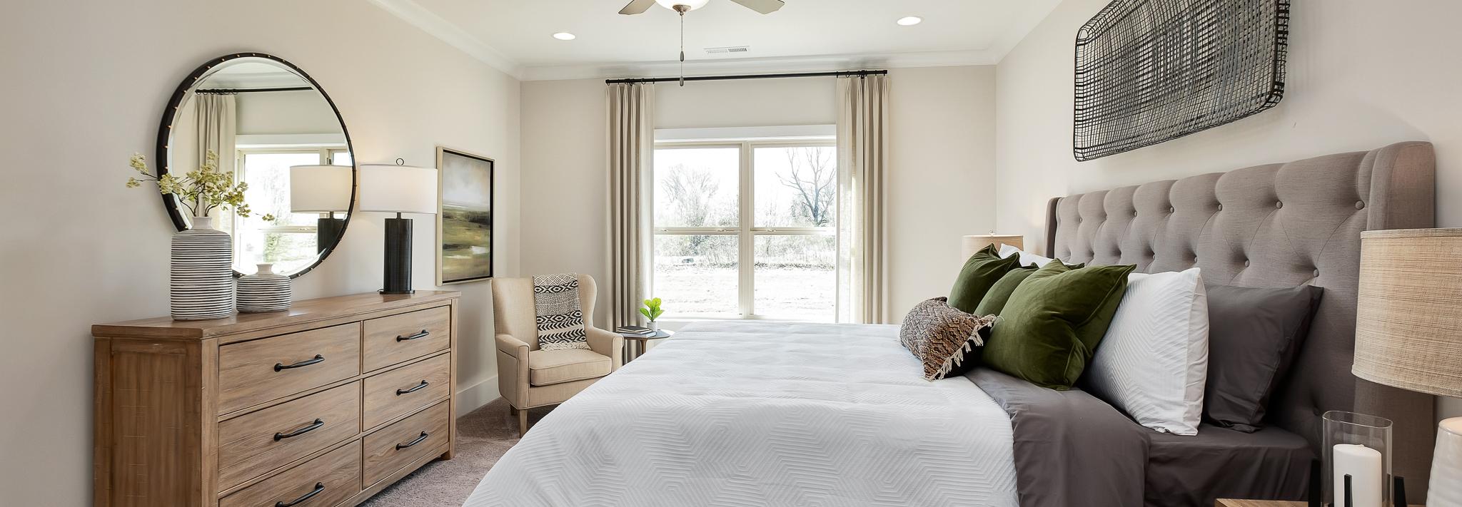 owner's suite with double windows in Magnolia Preserve in Hartselle, AL