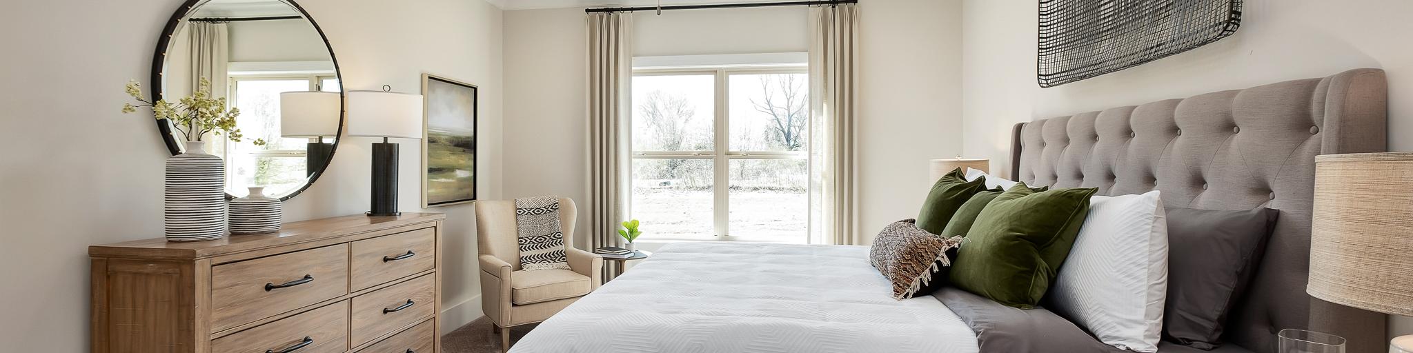 owner's suite with double windows in Magnolia Preserve in Hartselle, AL