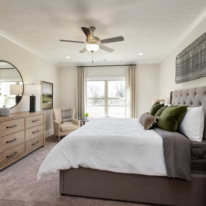 owner's suite with double windows in Magnolia Preserve in Hartselle, AL