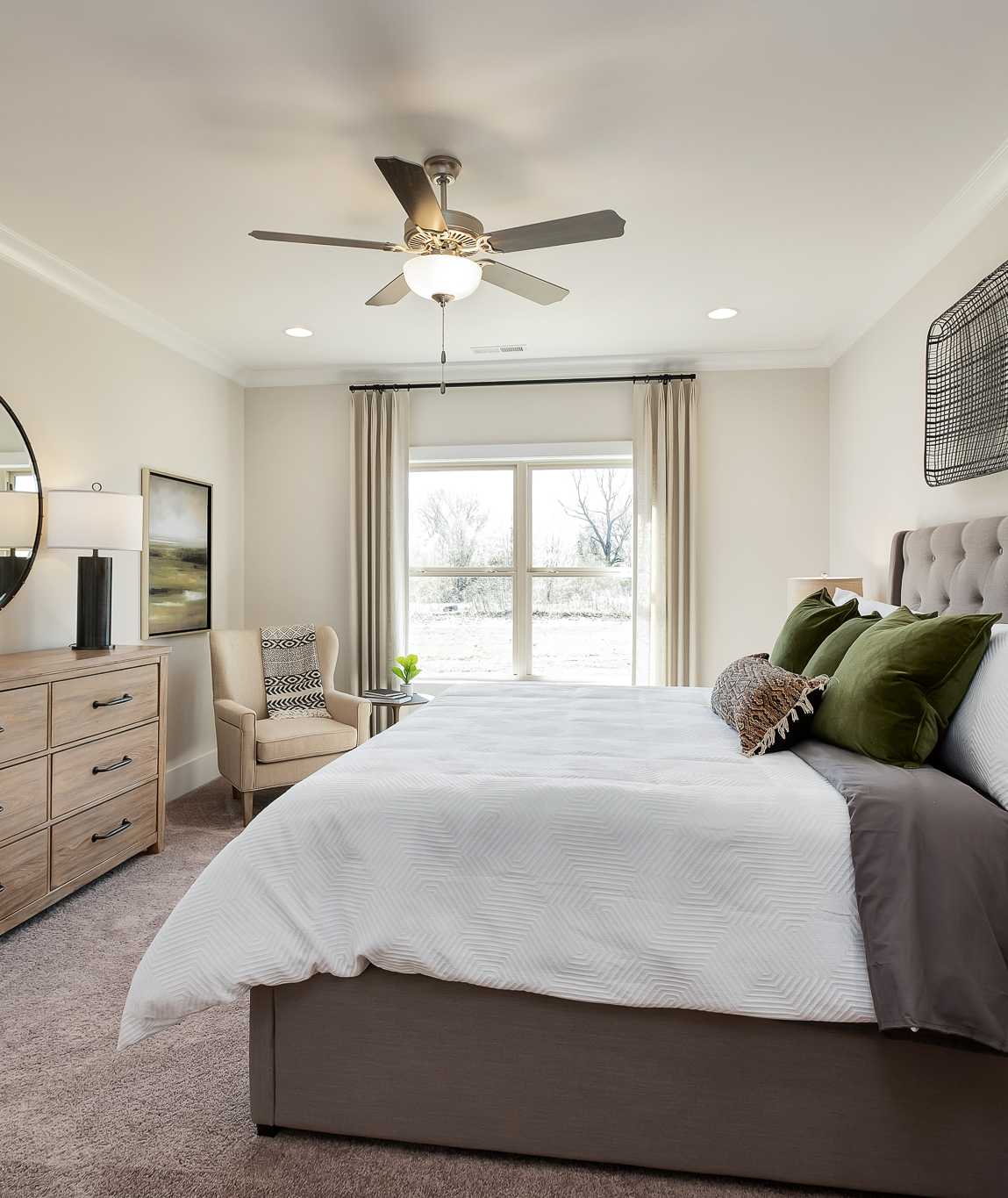 owner's suite with double windows in Magnolia Preserve in Hartselle, AL