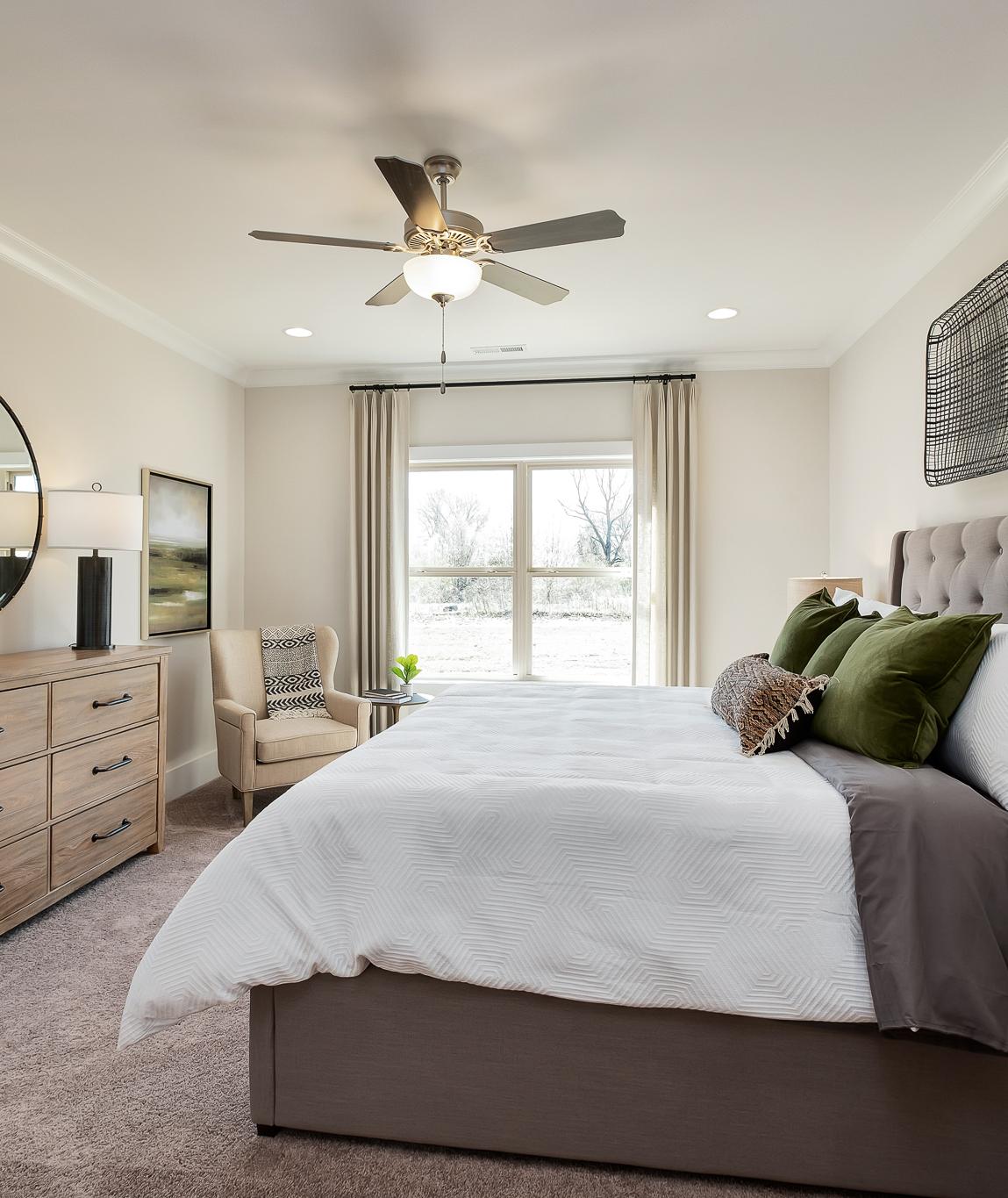 owner's suite with double windows in Magnolia Preserve in Hartselle, AL