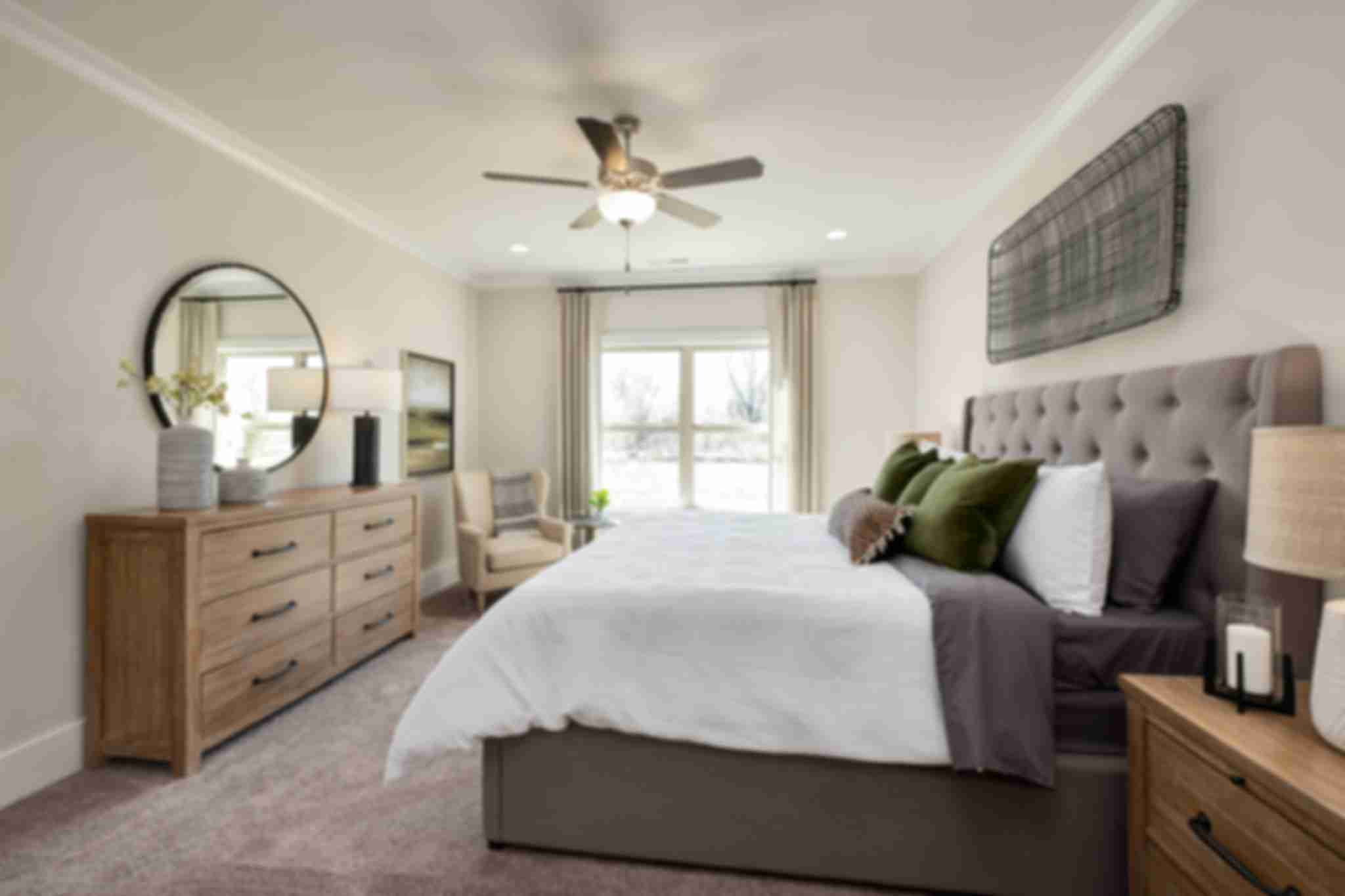 owner's suite with double windows in Magnolia Preserve in Hartselle, AL