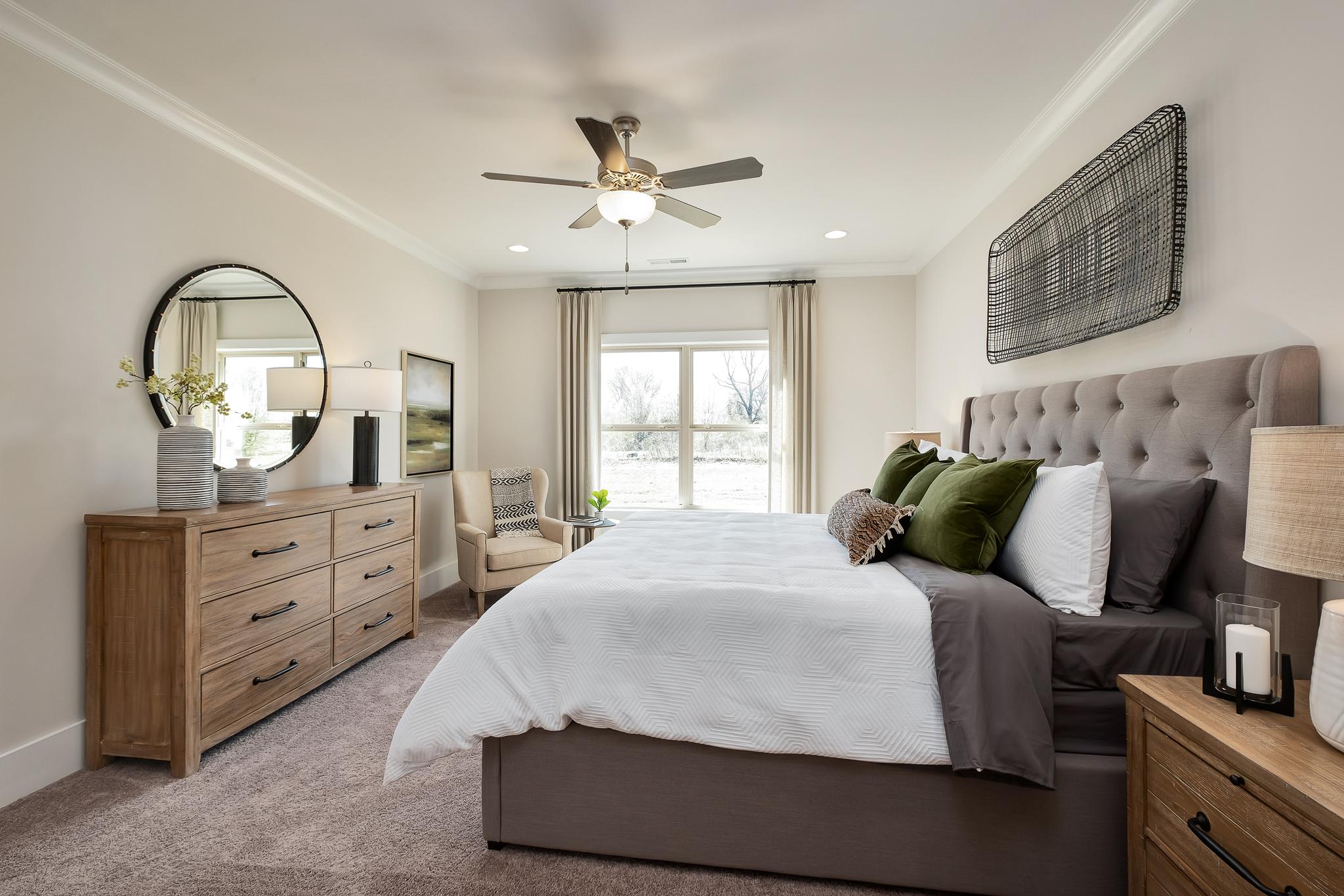 owner's suite with double windows in Magnolia Preserve in Hartselle, AL