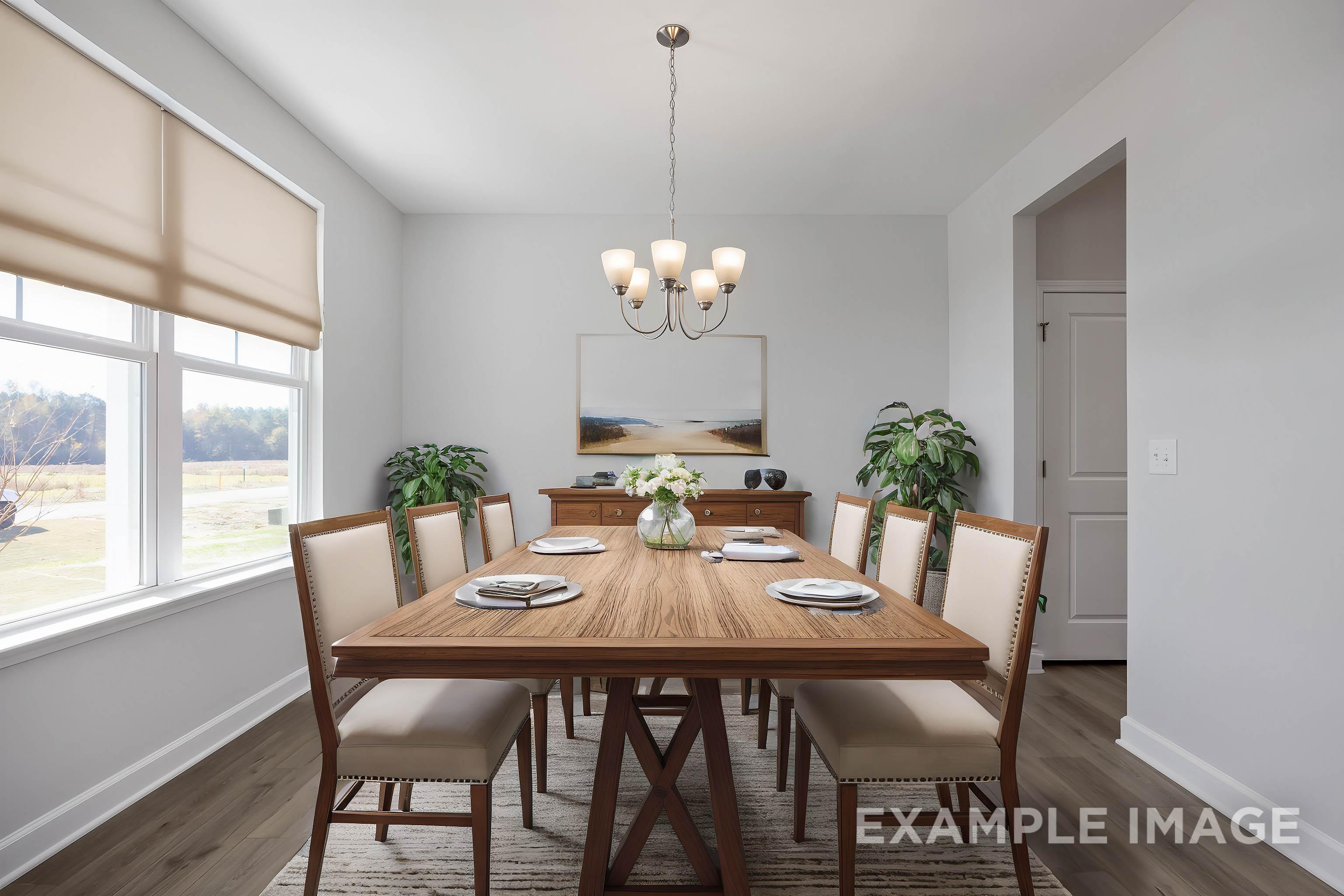 Spacious dining room in The Ash by Davidson Homes featuring wooden trestle table, chandelier, large windows, and potted plants