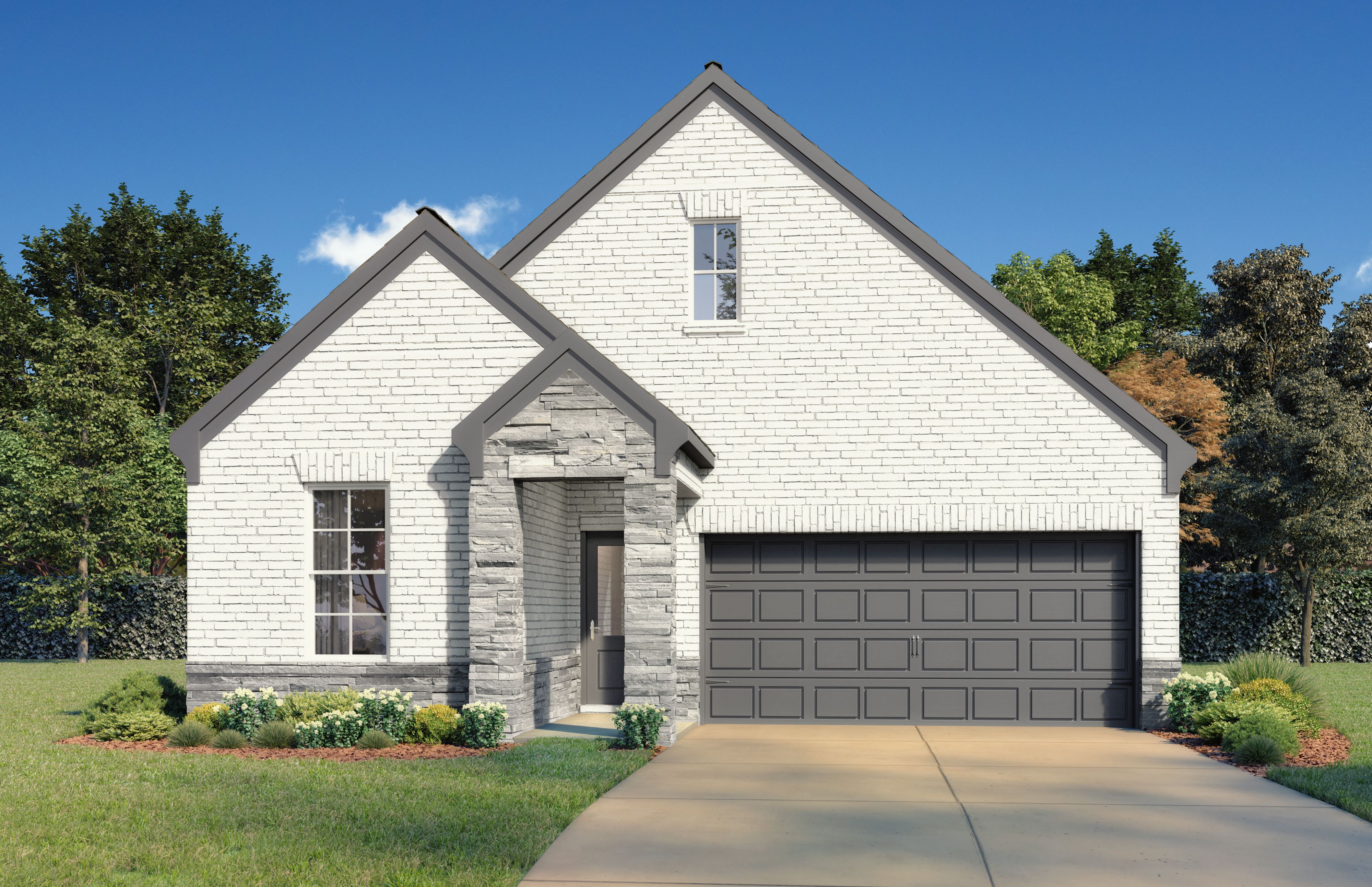 Modern white brick front elevation of The Brookside G 3-bedroom home with stone accents, two-car garage, and landscaped yard in Crosby, Texas