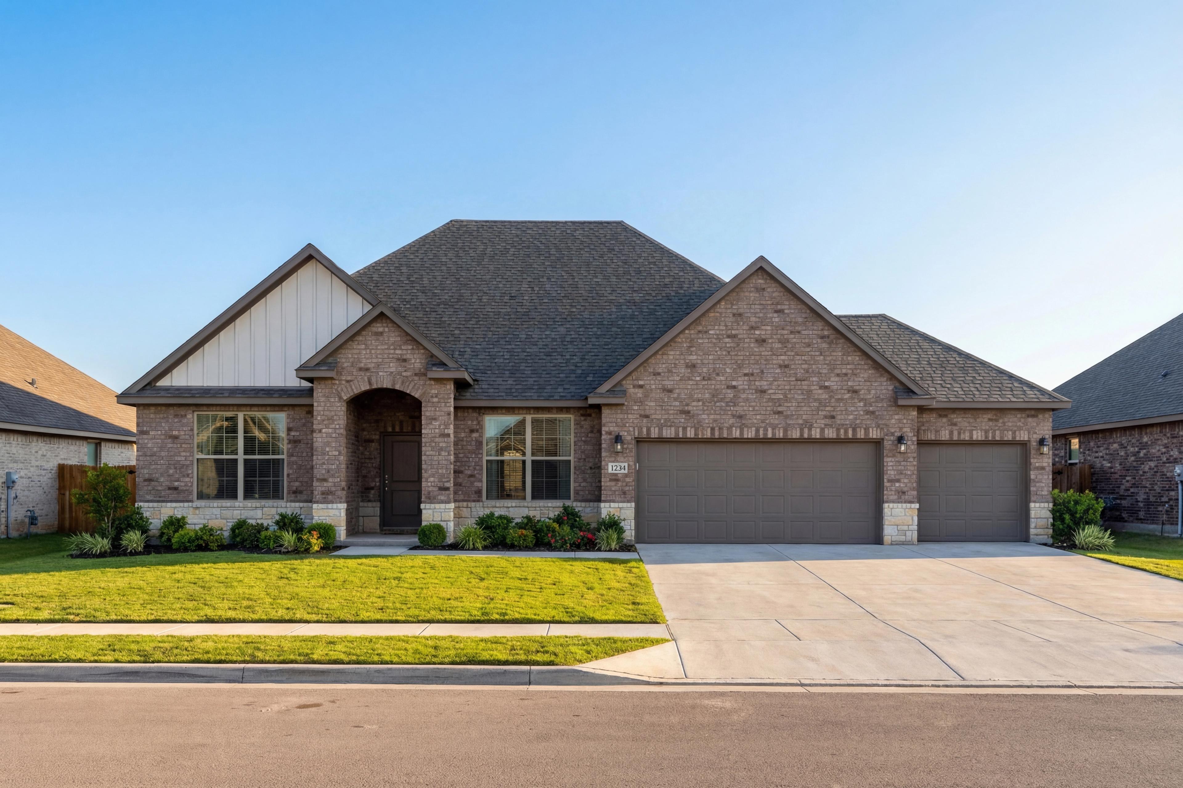 Modern single-story The Harrison D exterior with brick and siding, 3-car garage, arched entry, and lush green lawn