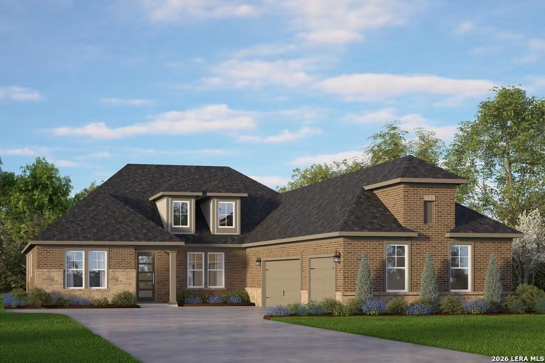 Modern 1-story brick home with 3-car garage, black roof, and landscaped front yard in Potranco Oaks, Castroville, Texas