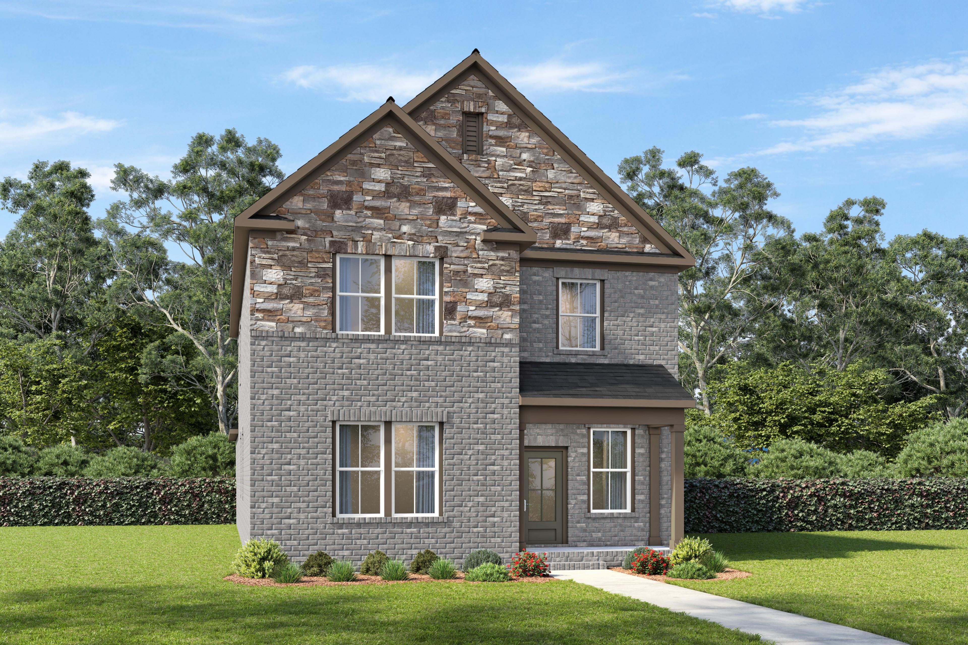 Two-story Oakmont A home design in Mt. Juliet featuring a classic brick and stone exterior with a two-car garage.
