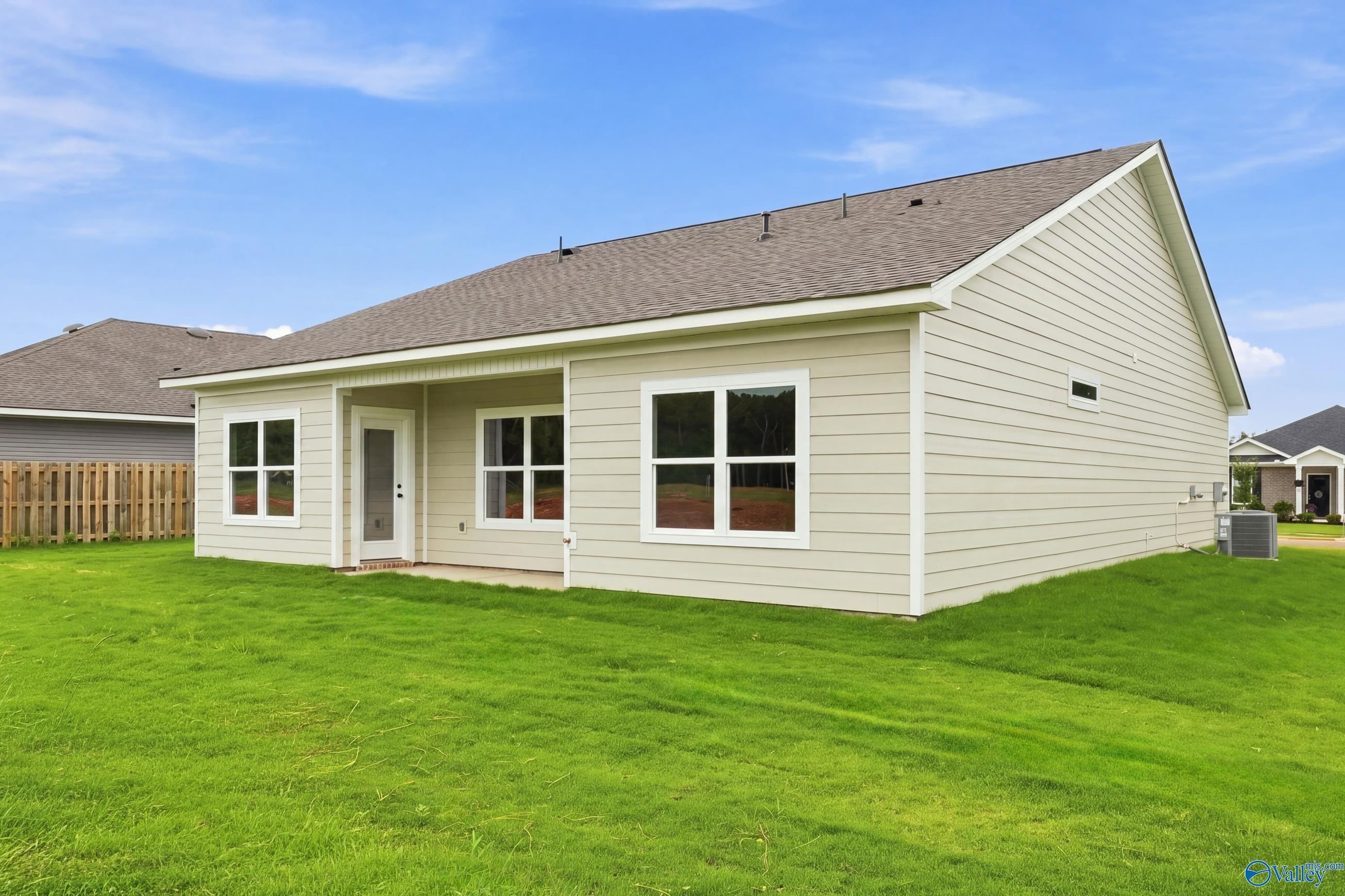 Back exterior view of The Asheville E floor plan by Davidson Homes in Forest Glen, Hazel Green, Alabama.