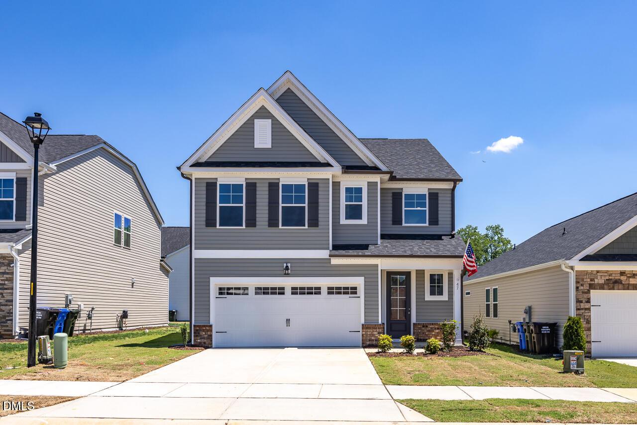 Two-story Davidson Homes Adalynn A floor plan with 2-car garage in Gregory Village, Lillington, North Carolina.