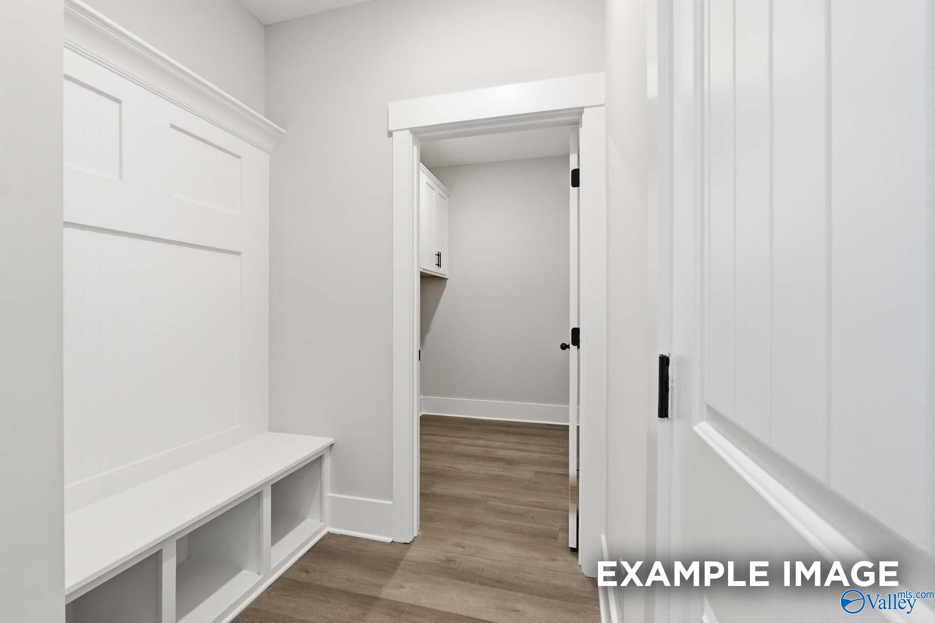 Built-in mudroom bench with storage in The Rockford floor plan by Davidson Homes in Briercreek, Meridianville, Alabama.