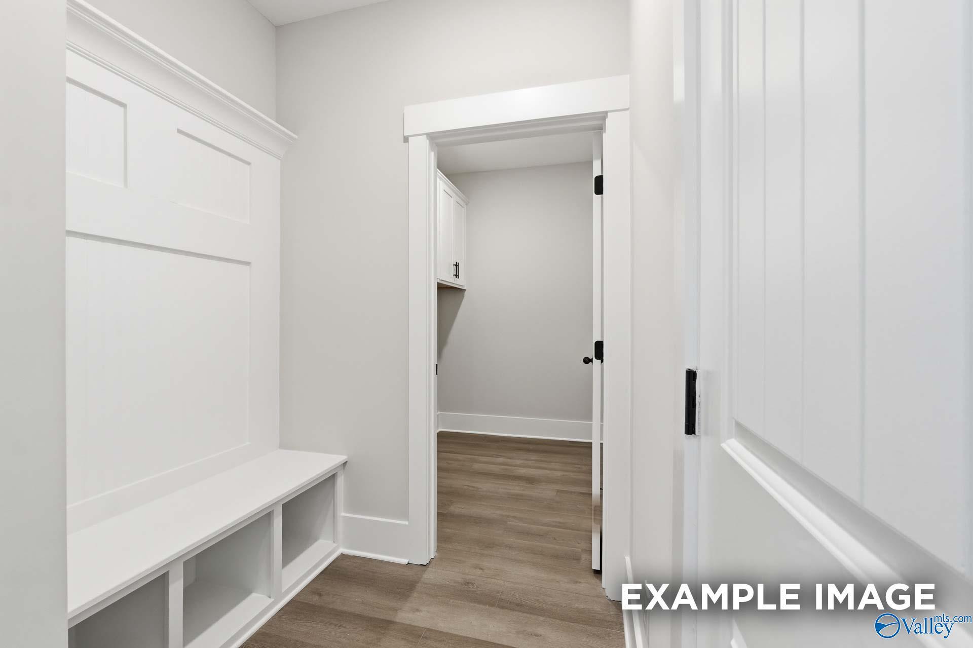 Built-in mudroom bench with storage in The Rockford floor plan by Davidson Homes in Briercreek, Meridianville, Alabama.