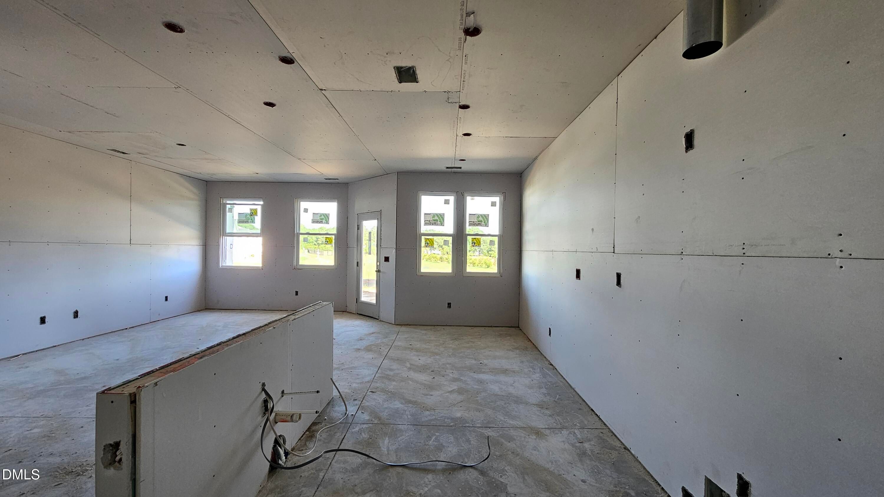 Open-concept construction phase of The Graham Interior floor plan at Springvale in Fuquay-Varina, North Carolina.