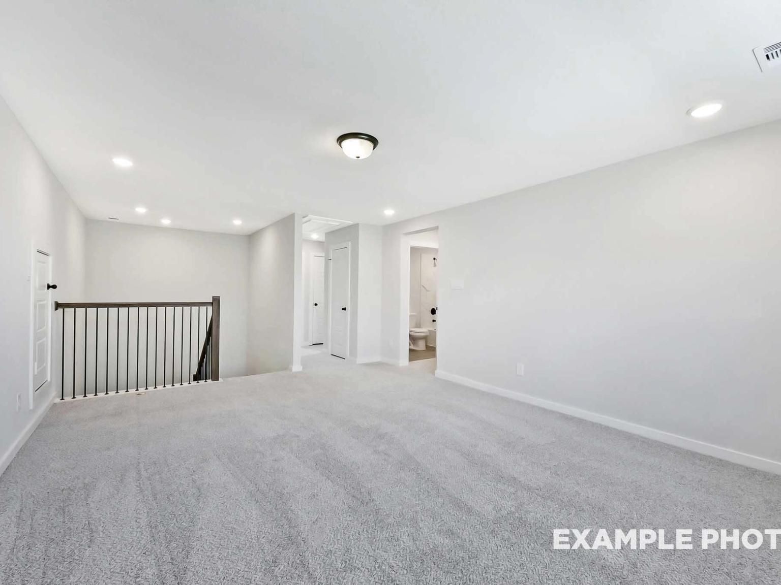 Spacious carpeted game room in The Sequoia C floor plan at Sundance Cove, Crosby, Texas by Davidson Homes.