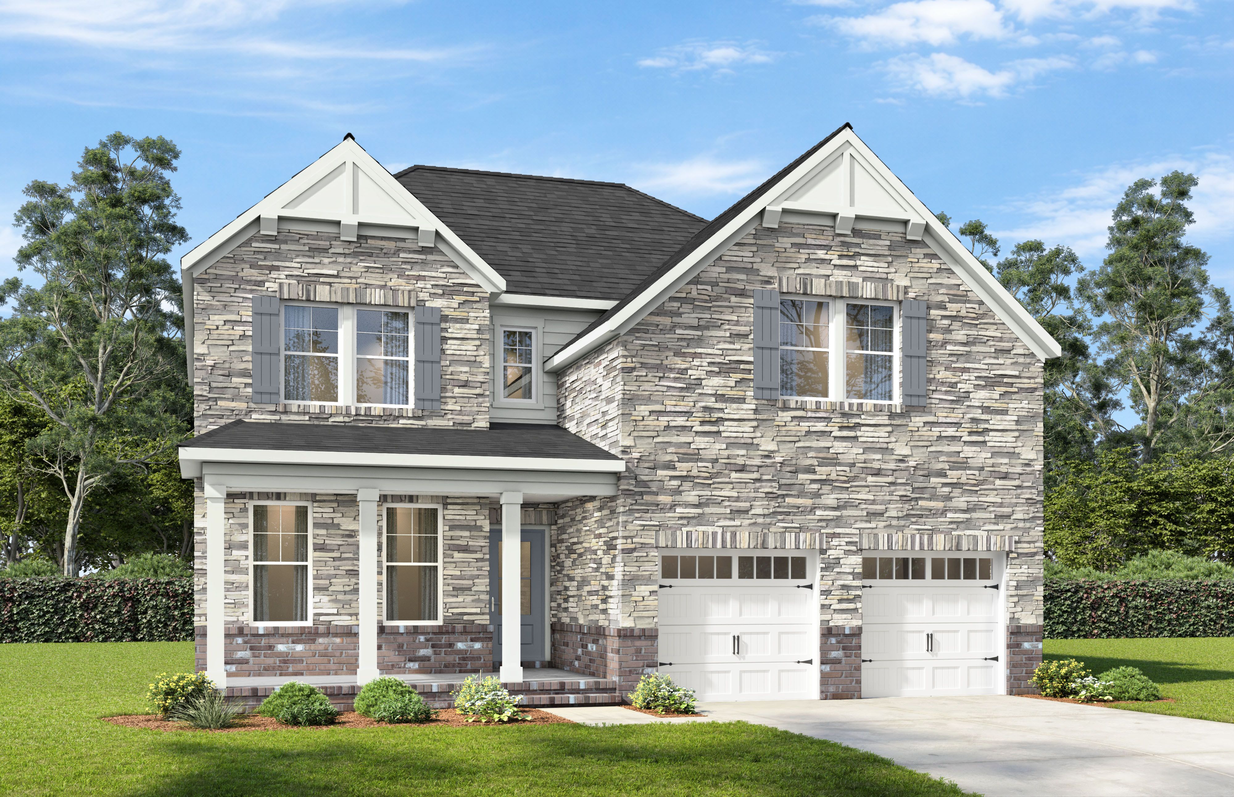 Two-story brick and stone elevation of The Willow A-BF by Davidson Homes in Mt. Juliet, TN with 2-car garage