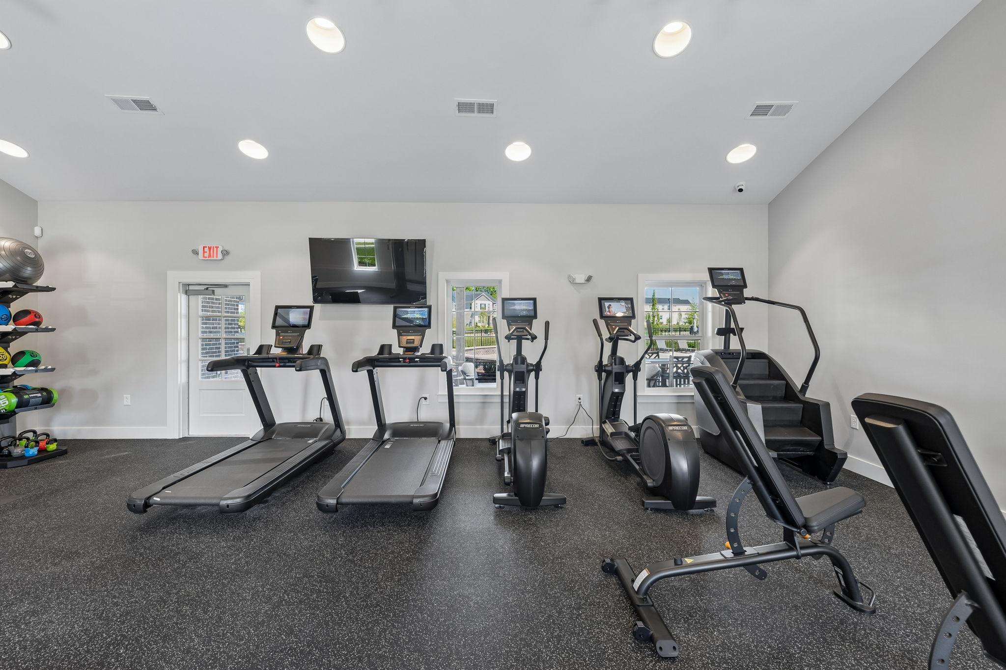 Fitness center at Bradshaw Farms in Mt. Juliet, TN with cardio machines, ellipticals, and strength training equipment.