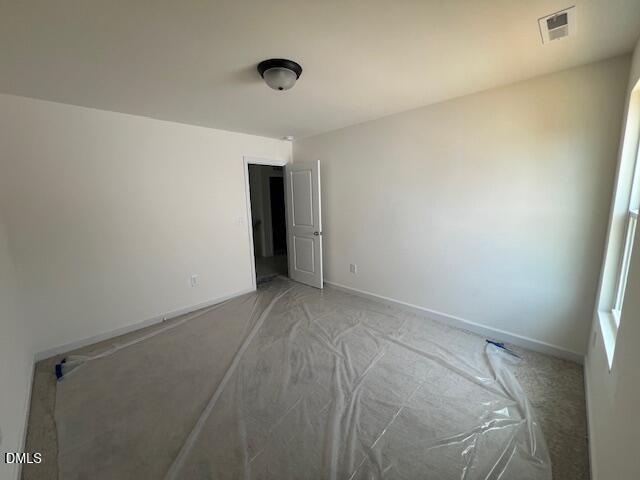 Bright, spacious bedroom in The Hickory II B floor plan at Retreat at North Main in Lillington, North Carolina.