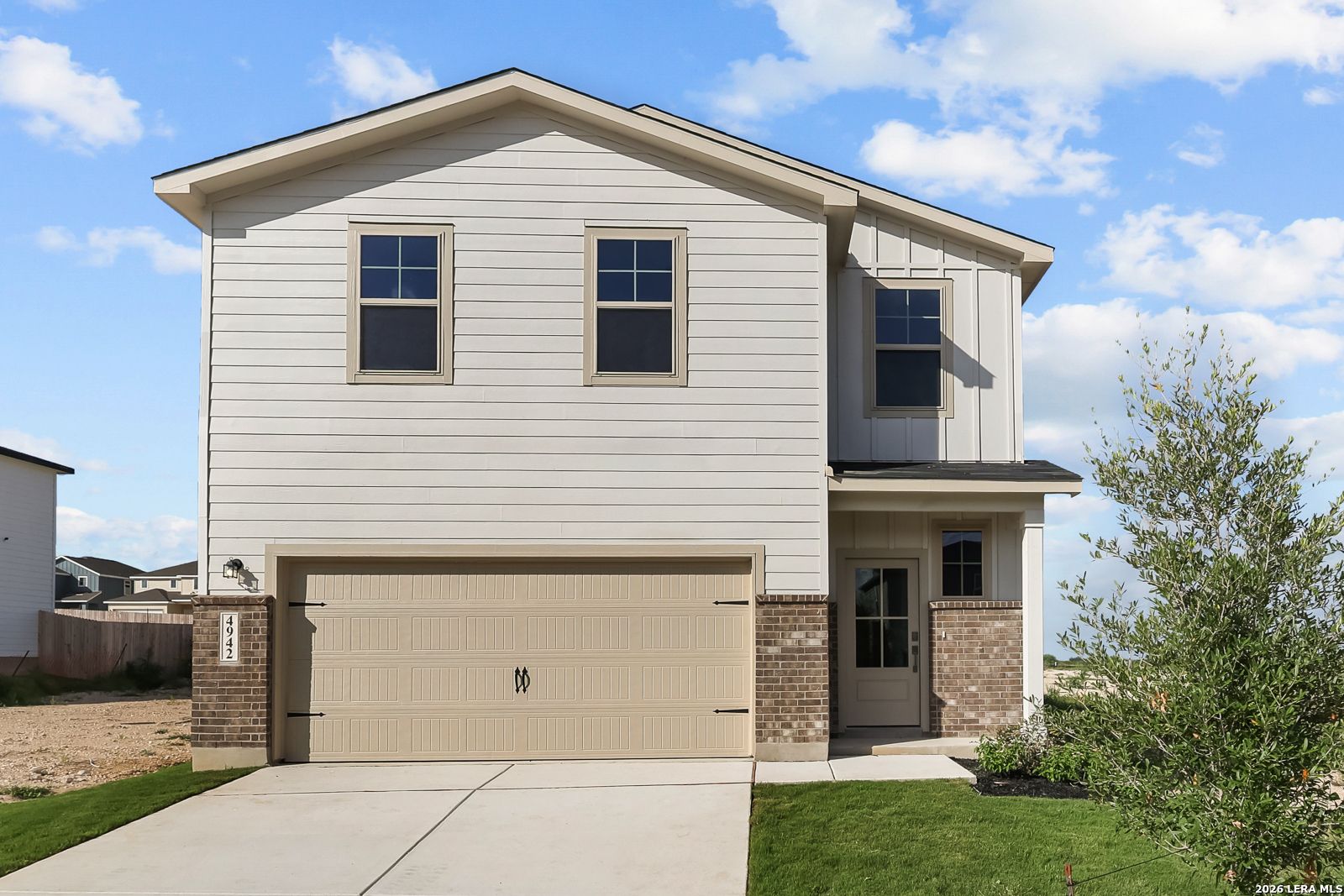 Two-story Brazos B floor plan by Davidson Homes with 2-car garage in Agave, San Antonio, Texas.