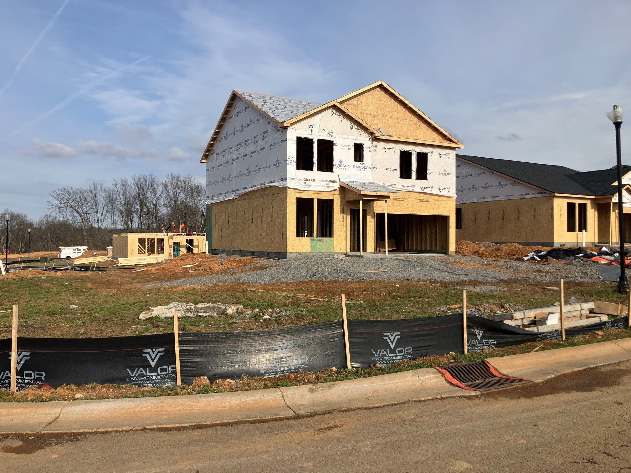 Framed two-story 4-bedroom home with 2-car garage under construction in Calista Farms, White House, TN by Davidson Homes Logan B
